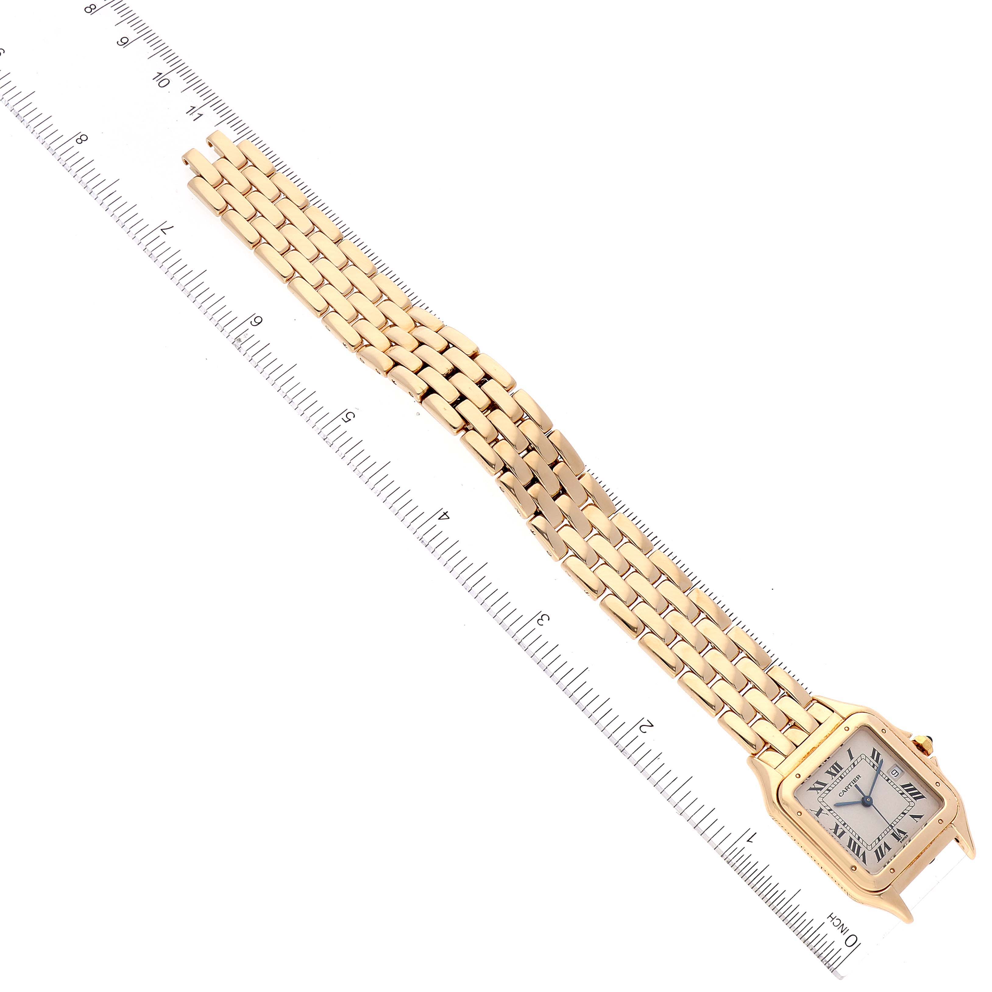 The image shows a Cartier Panthere W25014B9 Men's Yellow Gold Silver Dial W25014B9 Men's Yellow Gold Silver Dial watch laid flat with the face and entire bracelet fully visible, aligned next to a ruler.