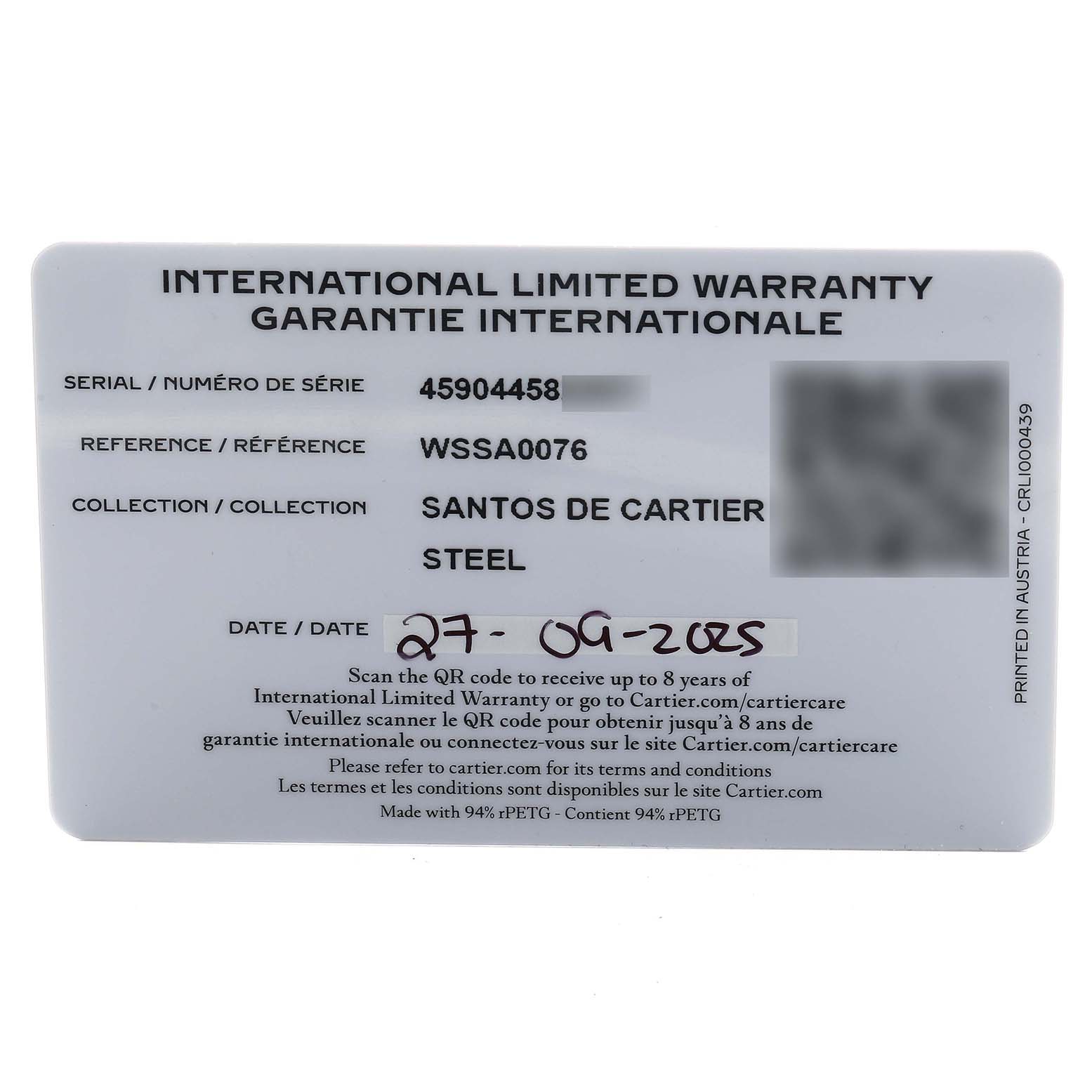 The image shows an international warranty card for the Santos de Cartier model, viewed from above.