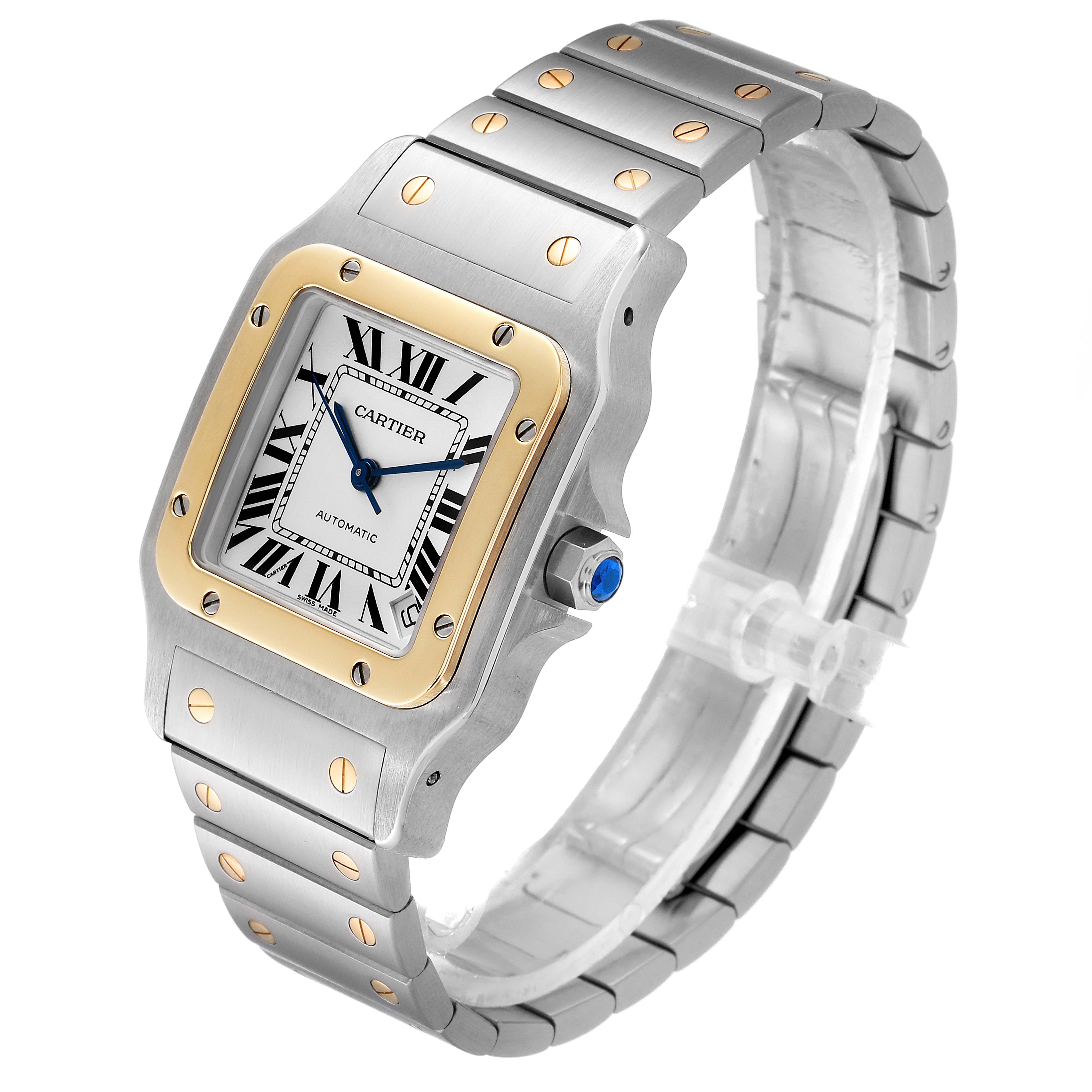 The image shows a Santos by Cartier watch from a slightly elevated angle, highlighting its bezel, dial, and bracelet.