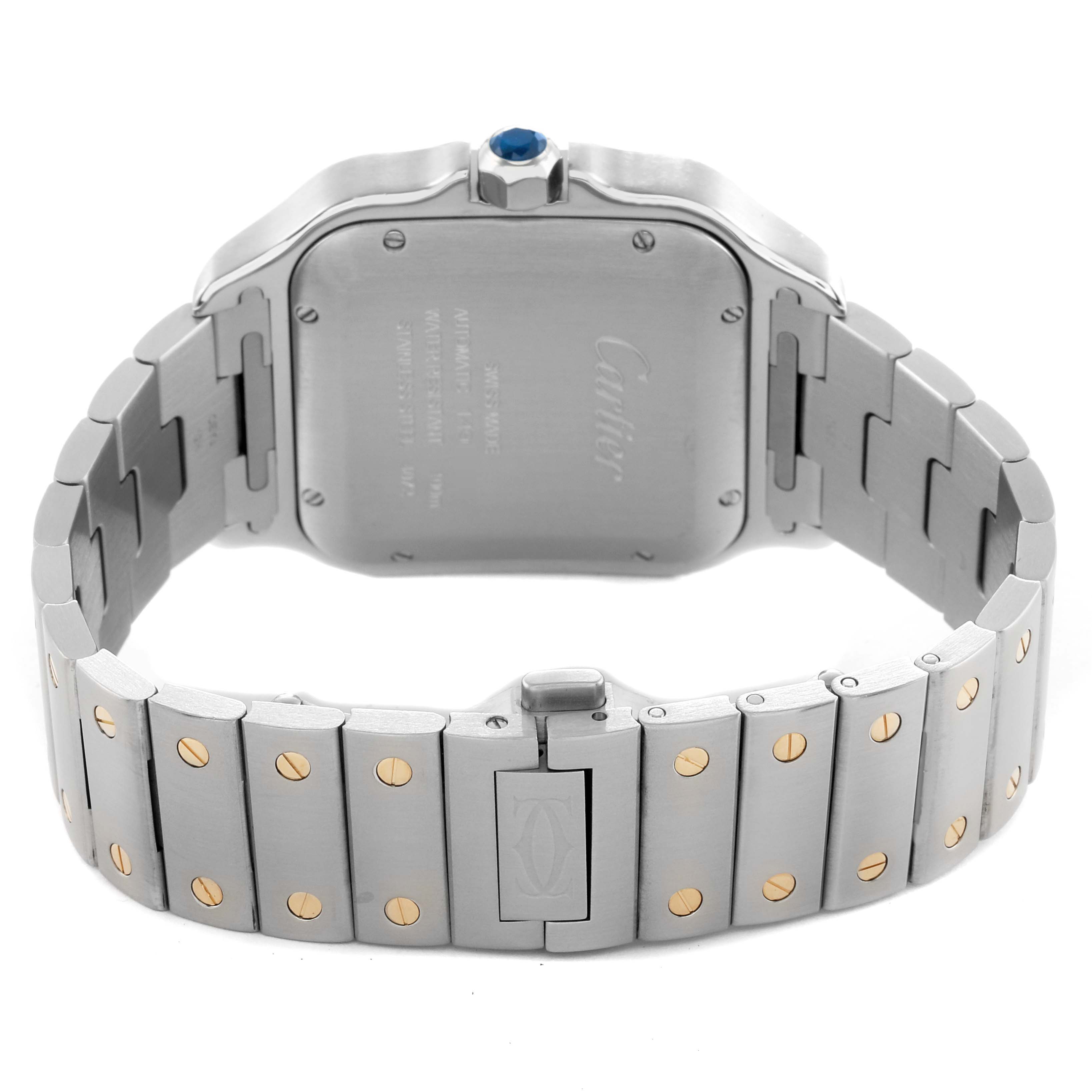 The image shows the back view of a Cartier Santos W2SA0006 Men's Steel and Gold (two tone) Silver Dial watch, detailing the case back, bracelet, and clasp.