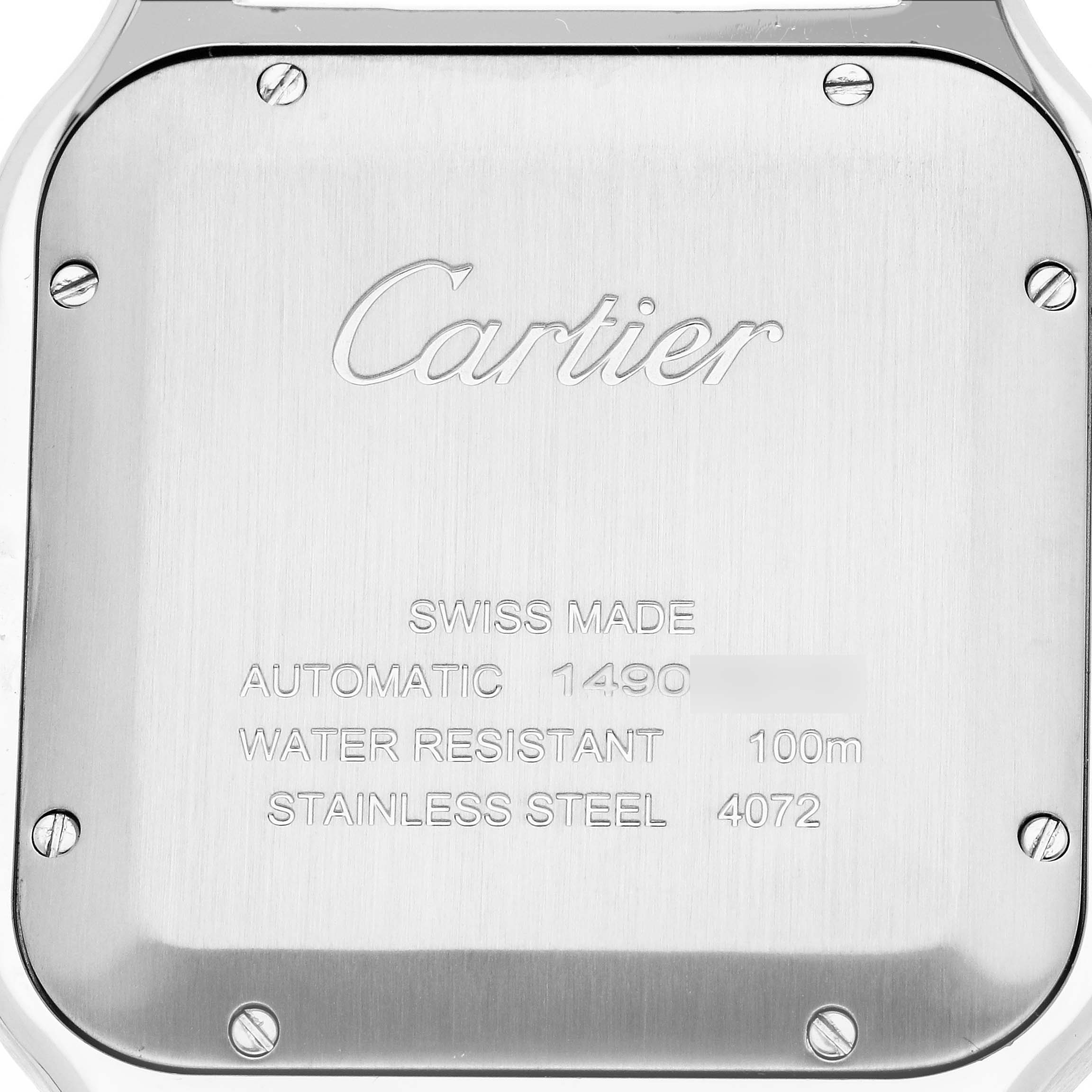 The image shows the back casing of a Cartier Santos W2SA0006 Men's Steel and Gold (two tone) Silver Dial watch, highlighting brand engravings and specifications.