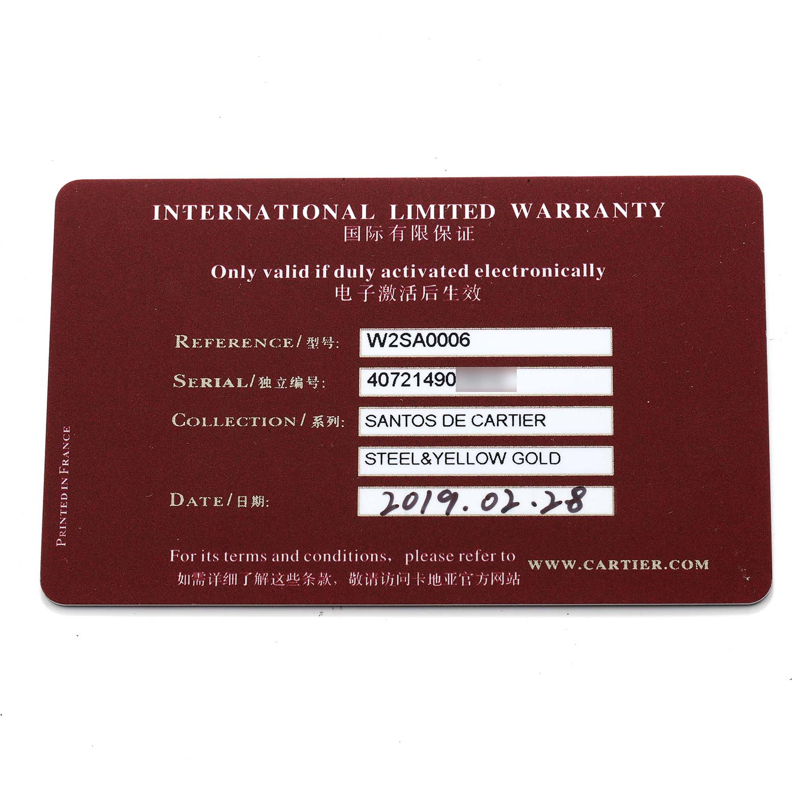 The image shows an international limited warranty card for a Cartier Santos W2SA0006 Men's Steel and Gold (two tone) Silver Dial model watch.