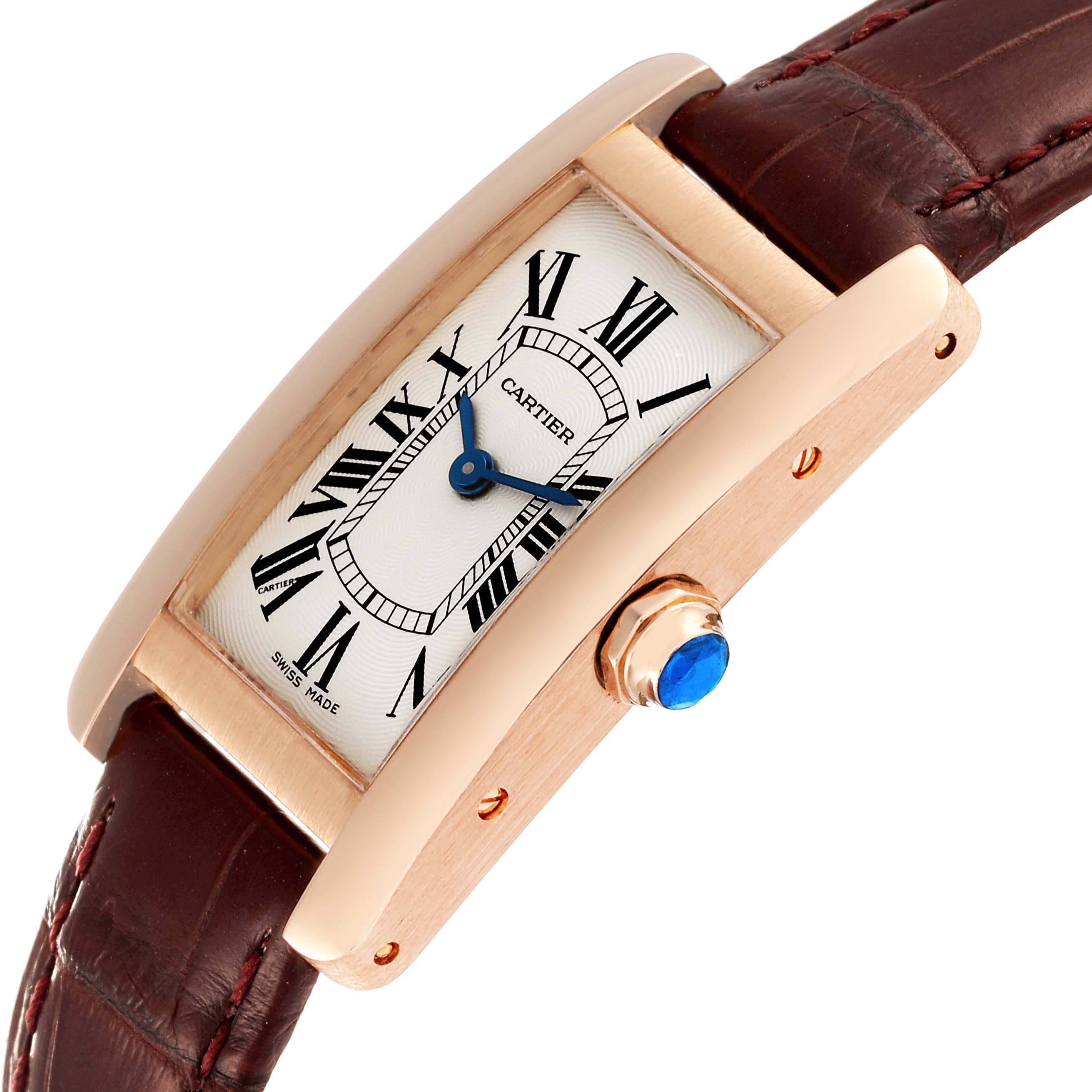 This image shows a Cartier Tank Américaine watch at an angled close-up, highlighting the dial, bezel, crown, and part of the strap.