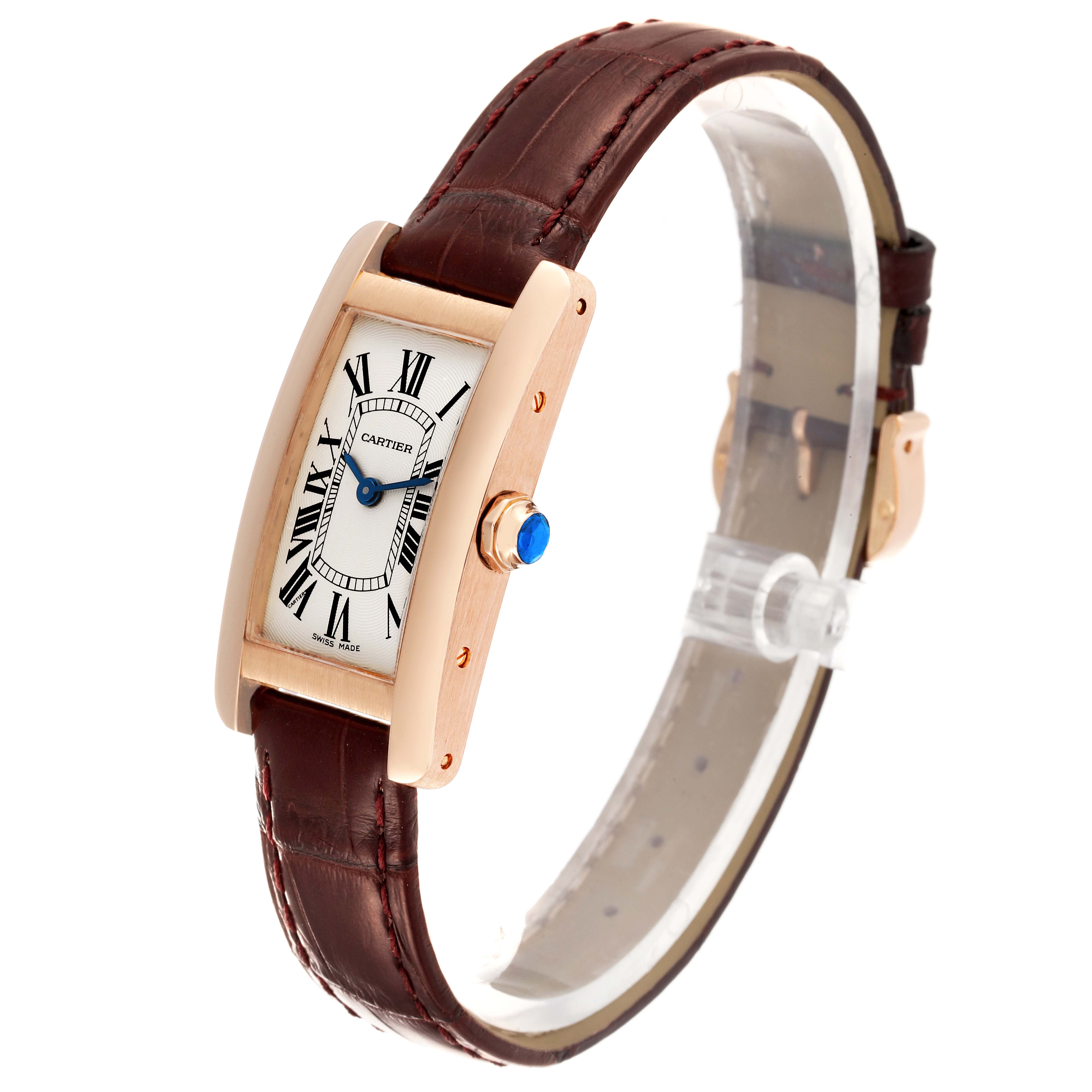 This image shows a Cartier Tank Americaine W2607456 Women's Rose Gold Silver Dial W2607456 Women's Rose Gold Silver Dial model watch, angled to display its face, strap, and side crown.