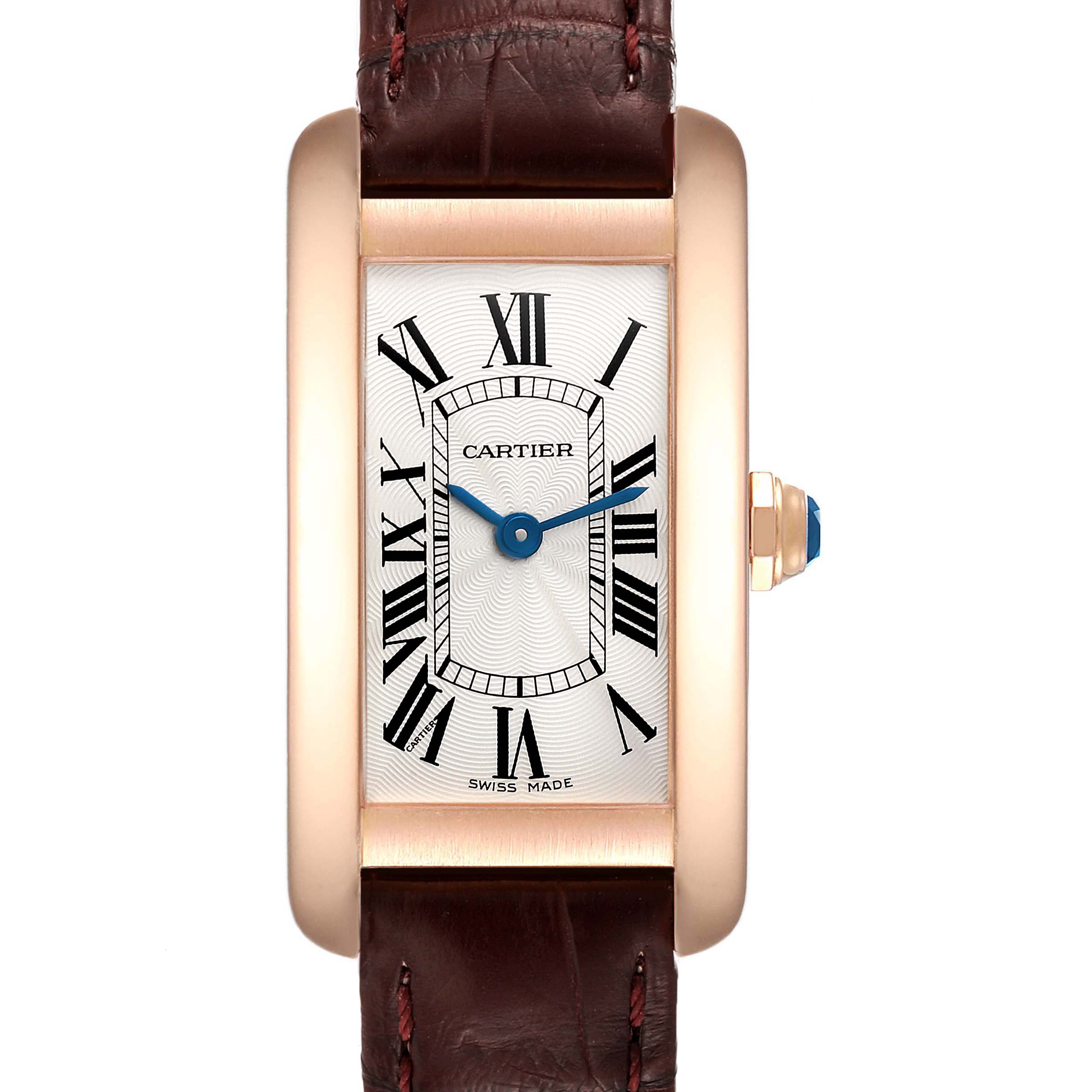 This image shows a frontal view of a Cartier Tank Americaine W2607456 Women's Rose Gold Silver Dial W2607456 Women's Rose Gold Silver Dial watch featuring a rectangular face, leather strap, and blue hands.