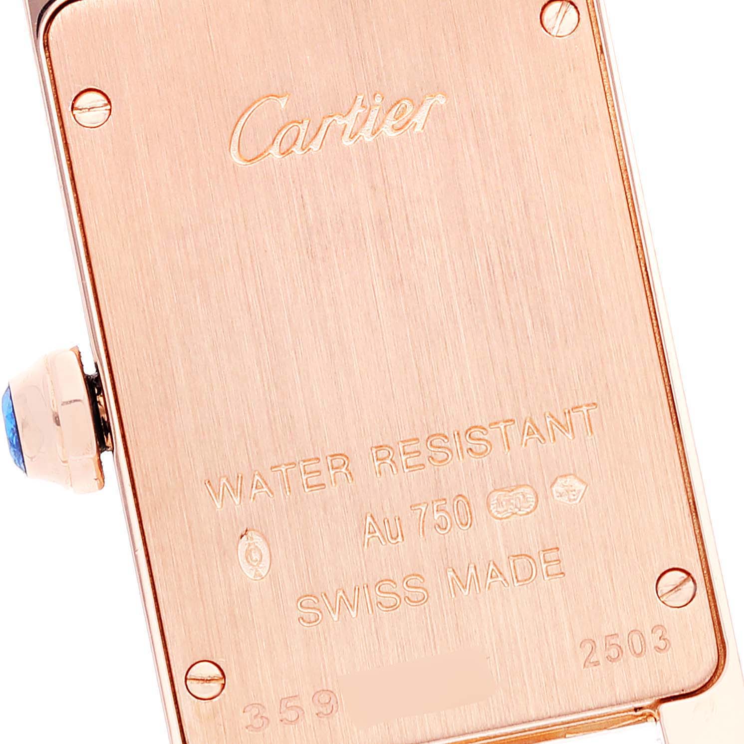 This image shows the back case and crown of a Cartier Tank Americaine W2607456 Women's Rose Gold Silver Dial W2607456 Women's Rose Gold Silver Dial watch.