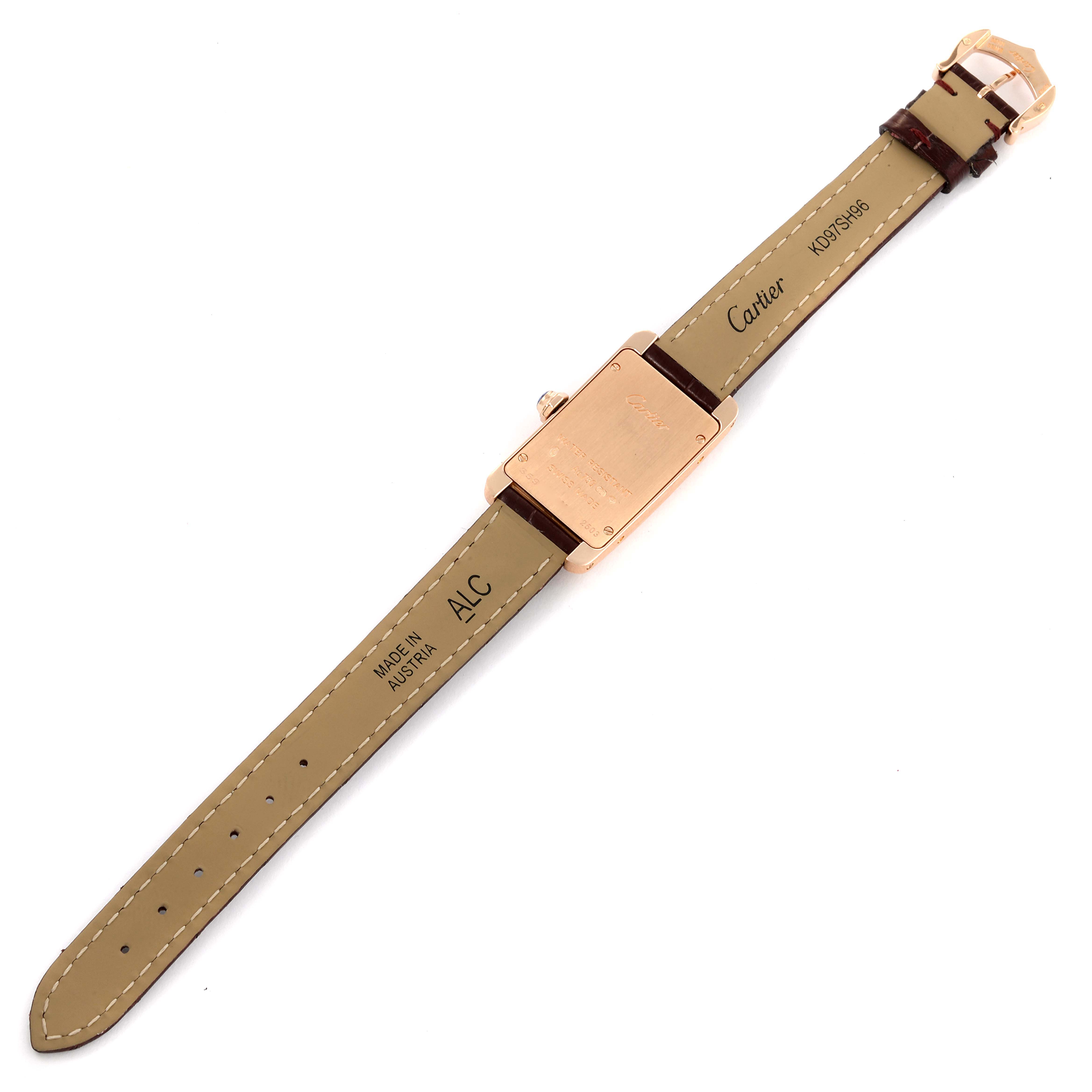 The image shows the back view of a Cartier Tank Americaine W2607456 Women's Rose Gold Silver Dial W2607456 Women's Rose Gold Silver Dial watch, displaying the underside of the strap and case.