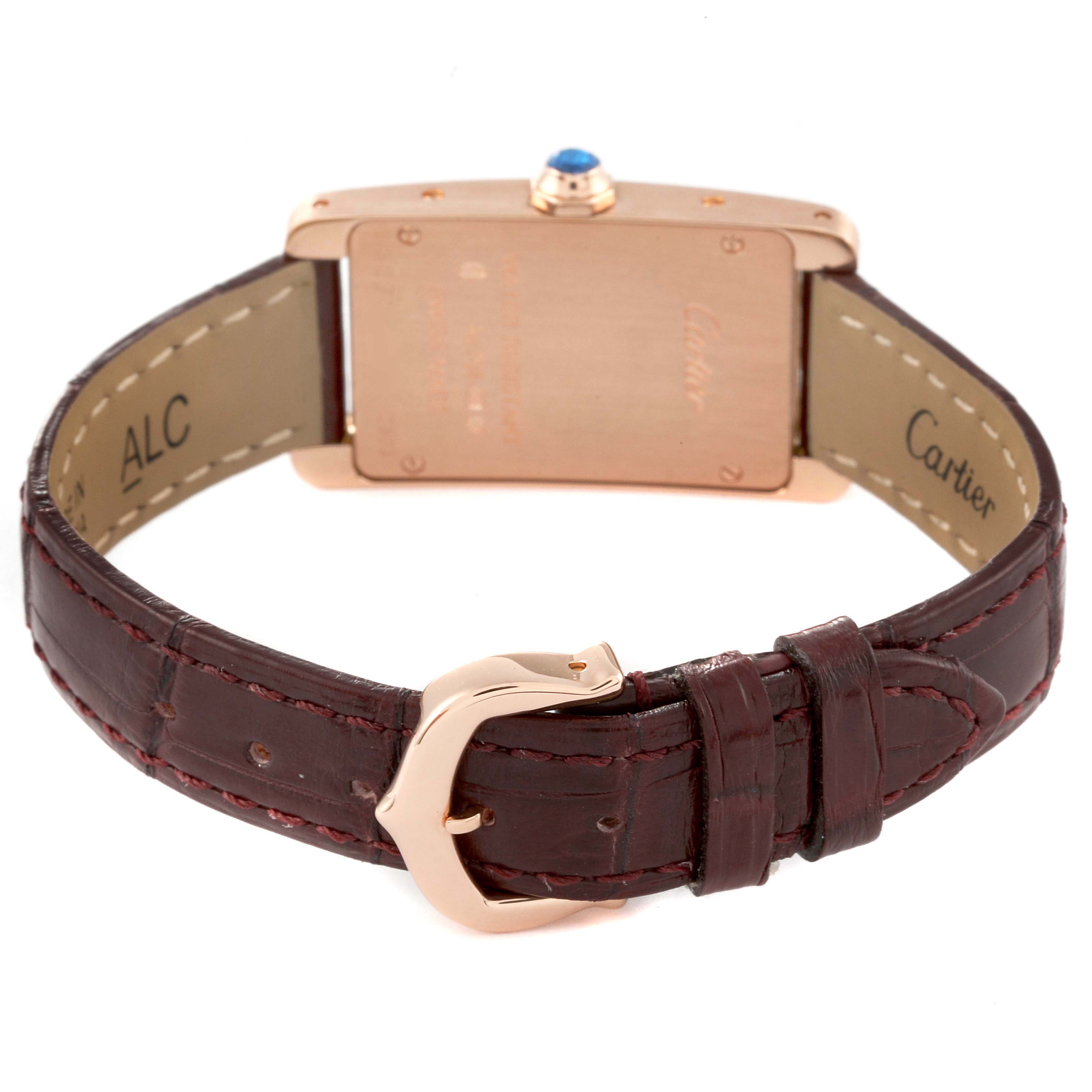 The image shows the back view of a Cartier Tank Americaine W2607456 Women's Rose Gold Silver Dial W2607456 Women's Rose Gold Silver Dial watch, focusing on the case, strap, and buckle.