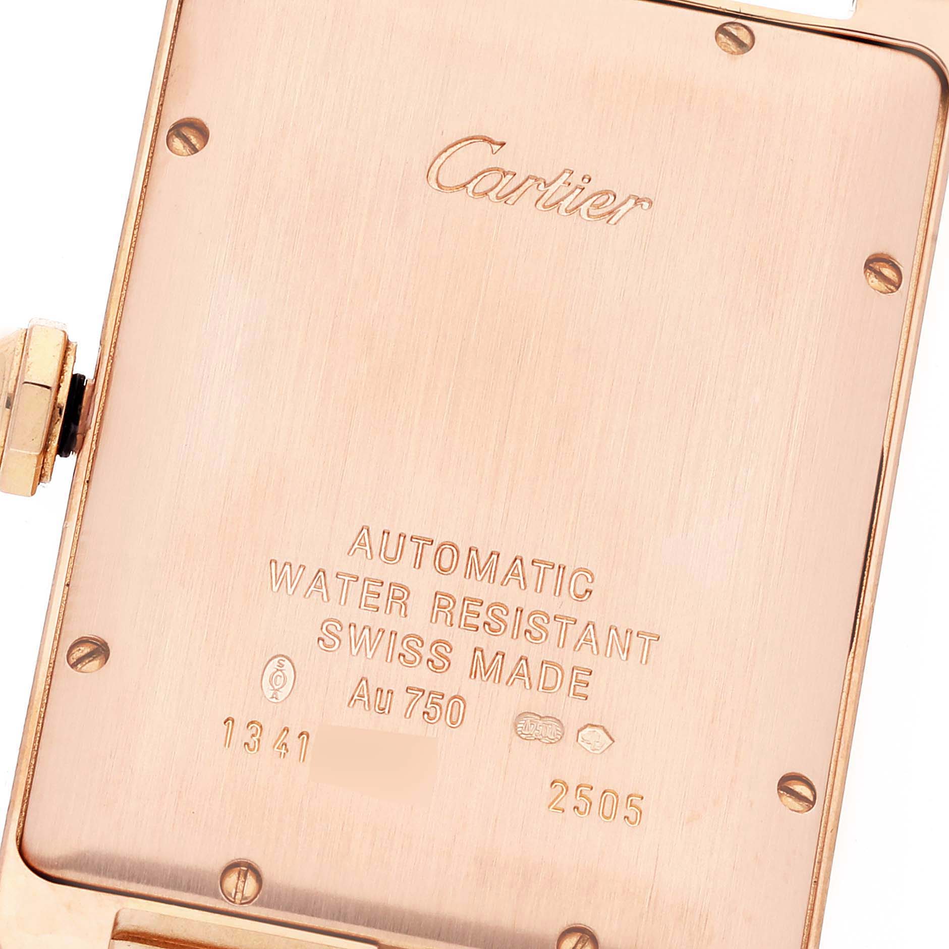 The image shows the back of a Cartier Tank Americaine W2609156 Men
s Rose Gold Silver Dial W2609156 Men
s Rose Gold Silver Dial watch, highlighting the engravings and screws.