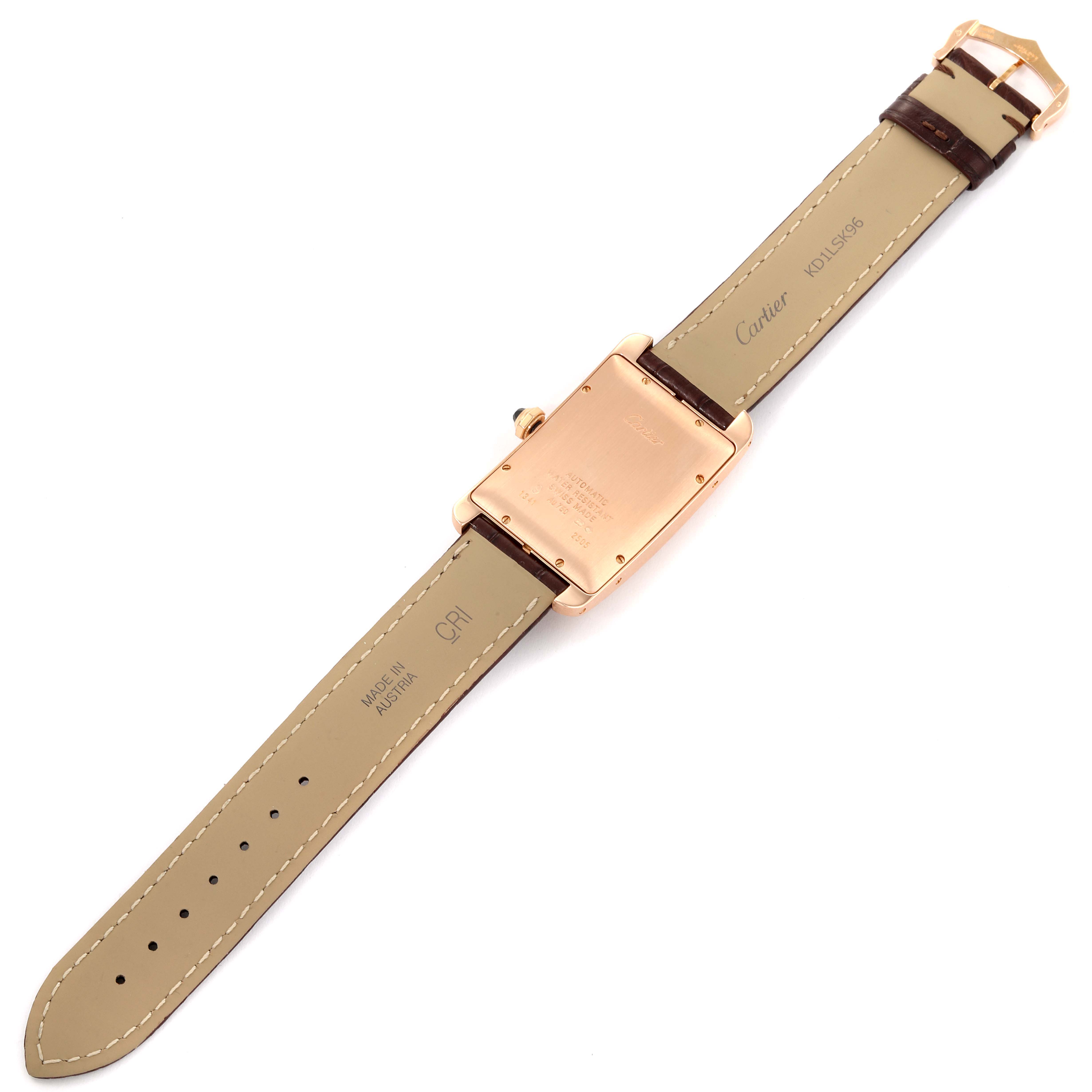 The image shows the back view of the Cartier Tank Americaine W2609156 Men
s Rose Gold Silver Dial W2609156 Men
s Rose Gold Silver Dial watch, displaying the case back and leather straps.