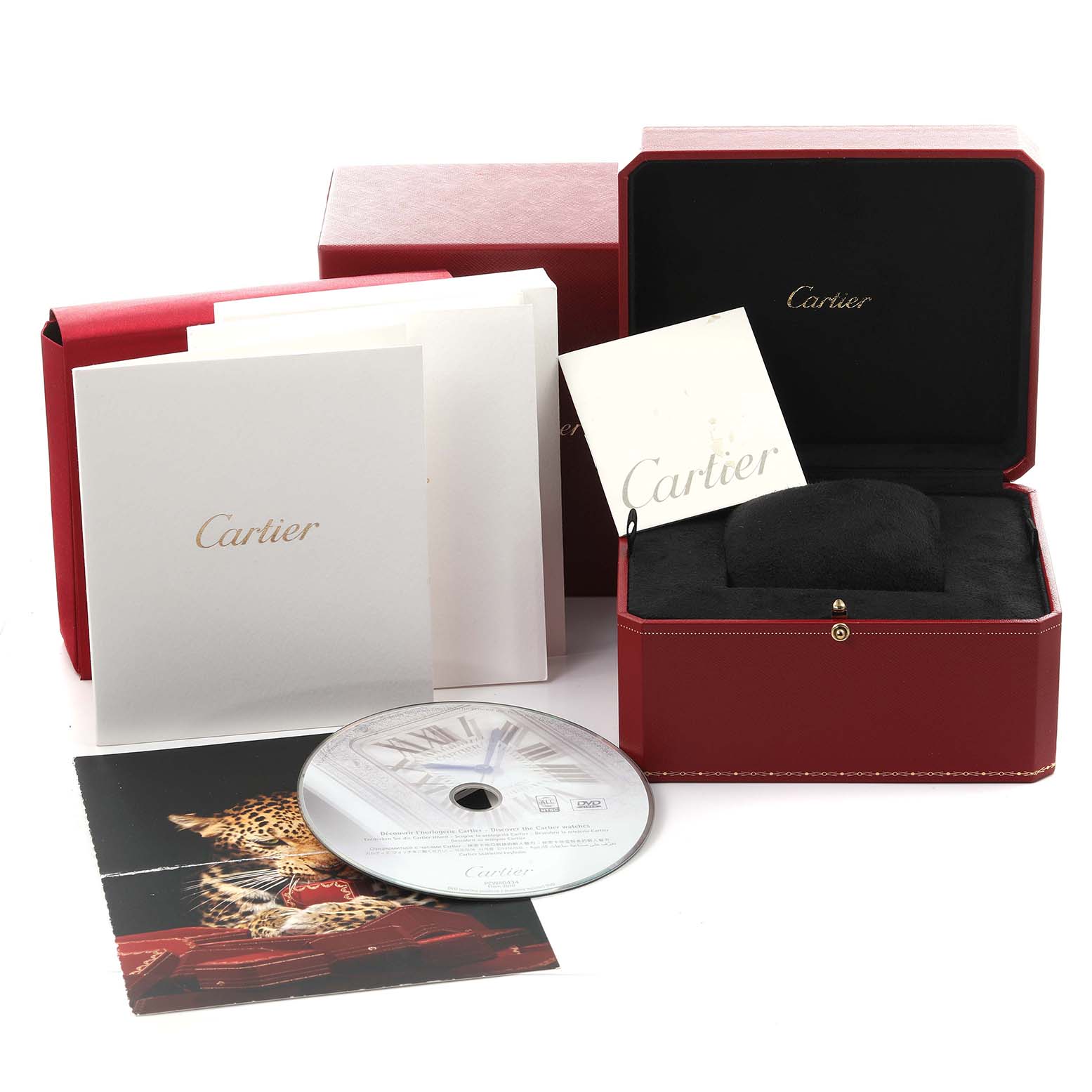 The image shows a Cartier Tank Americaine 2504 Women's Rose Gold Silver Dial 2504 Women's Rose Gold Silver Dial watch box, manuals, and a CD, but not the watch itself.