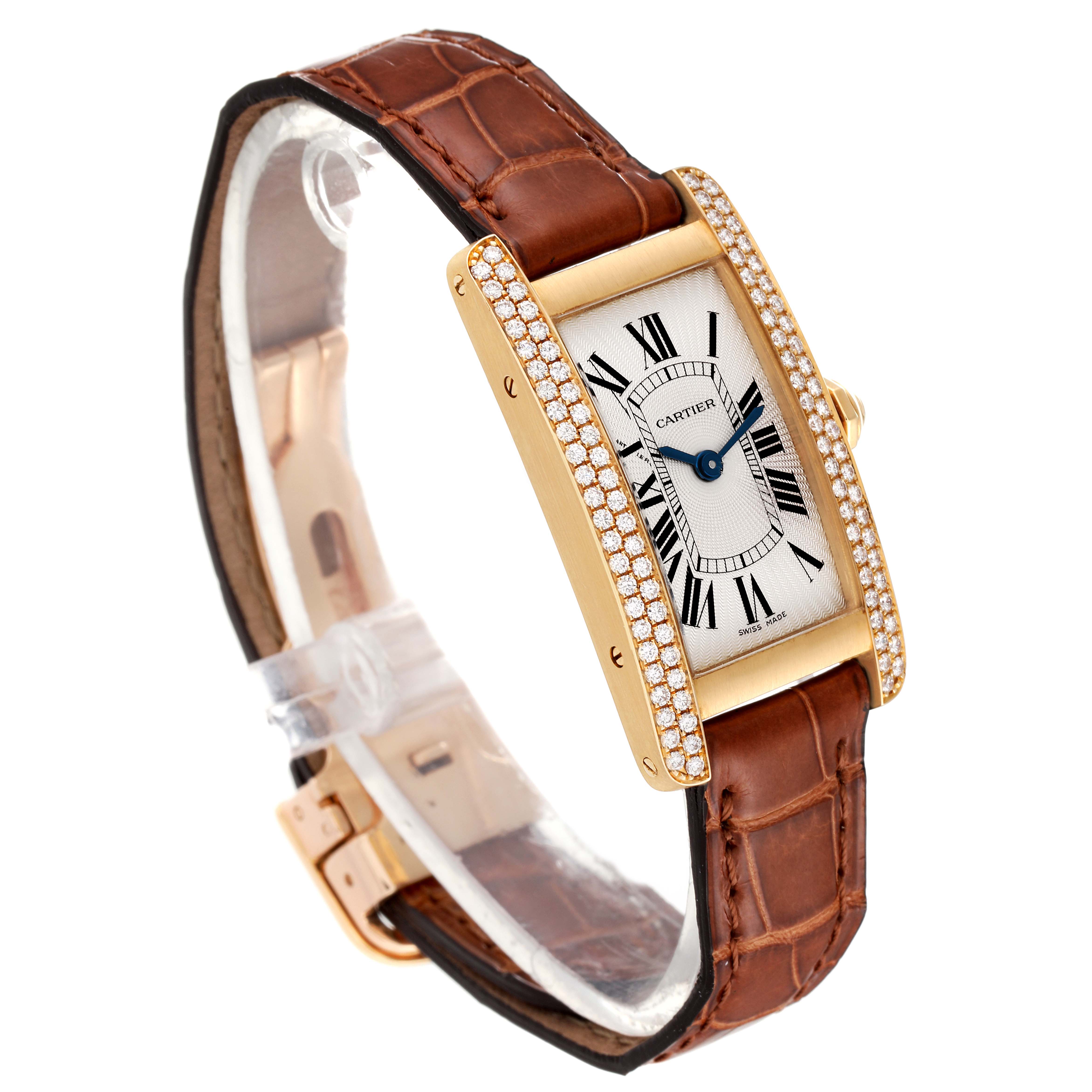 The image shows a Cartier Tank Américaine watch at an angle that highlights its rectangular face, diamond-encrusted bezel, and leather strap.