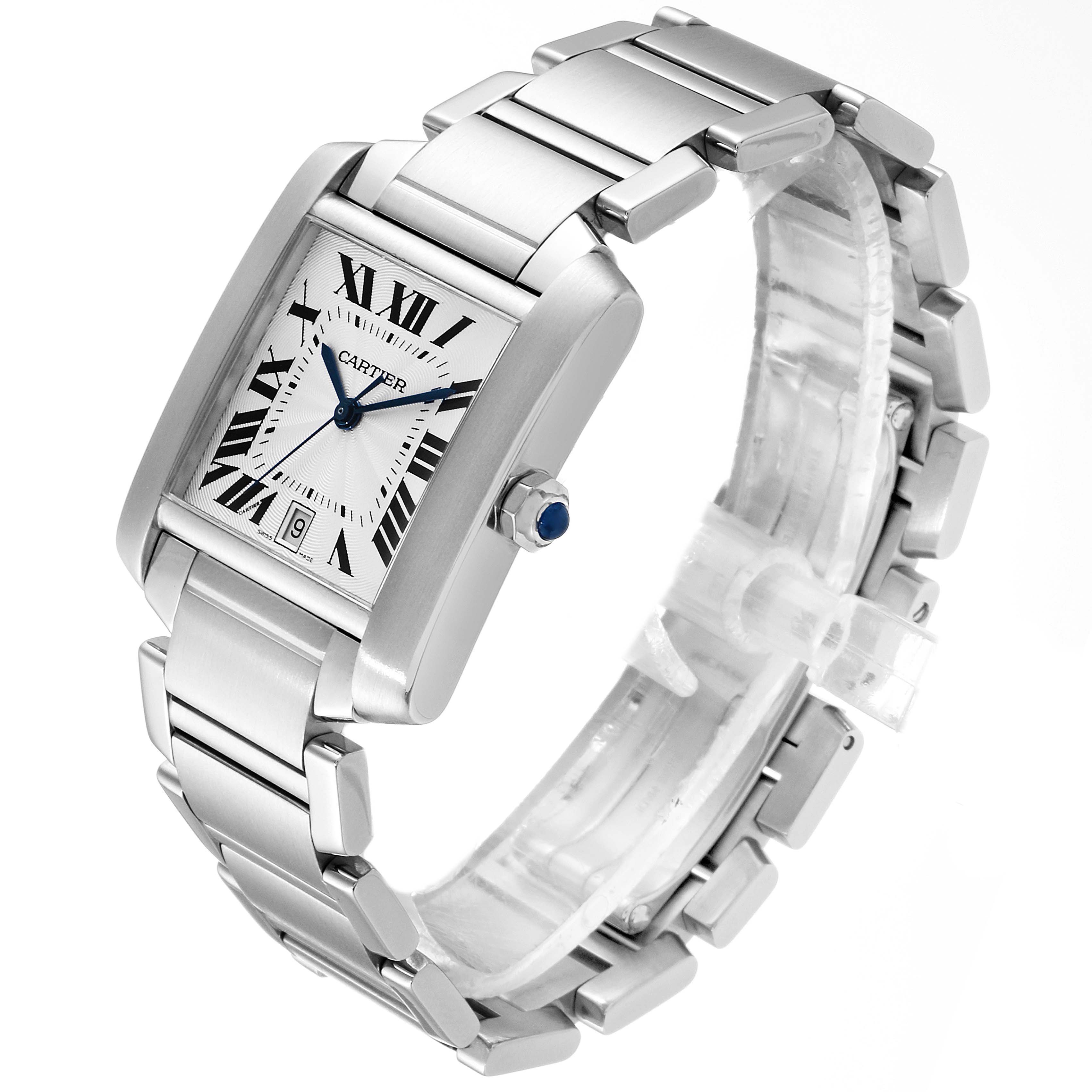 This image shows a Cartier Tank Française watch at an angle displaying the face, Roman numerals, bracelet, and blue sapphire crown.