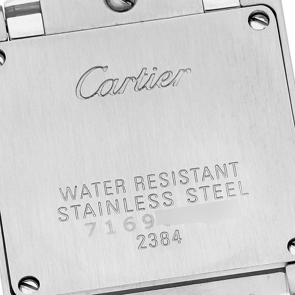 The image shows the back case of a Cartier Tank Française watch, highlighting the brand name and water resistance details.
