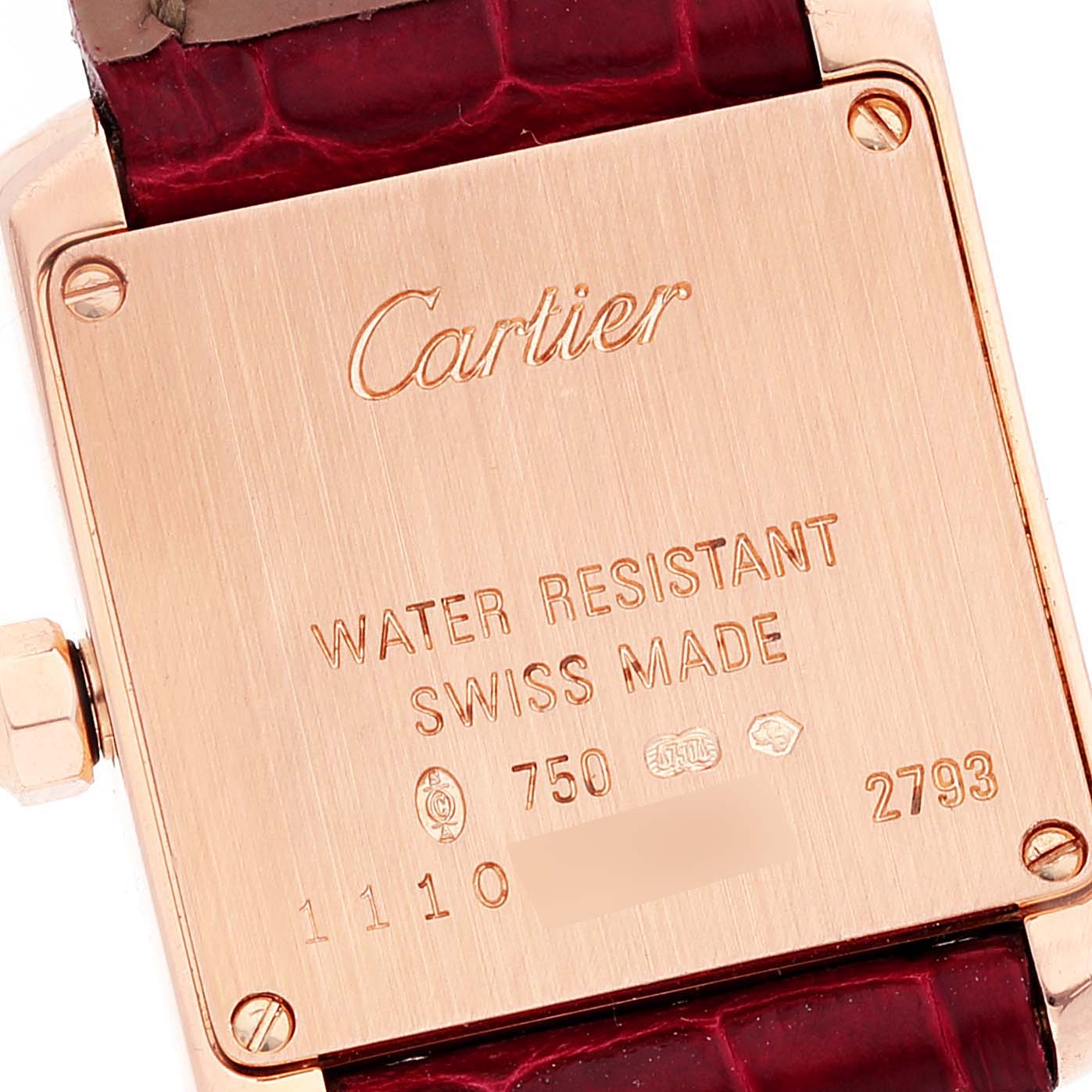 This image shows the back case and part of the strap of a Cartier Tank Francaise WE104531 Women's Rose Gold Silver Dial WE104531 Women's Rose Gold Silver Dial watch.