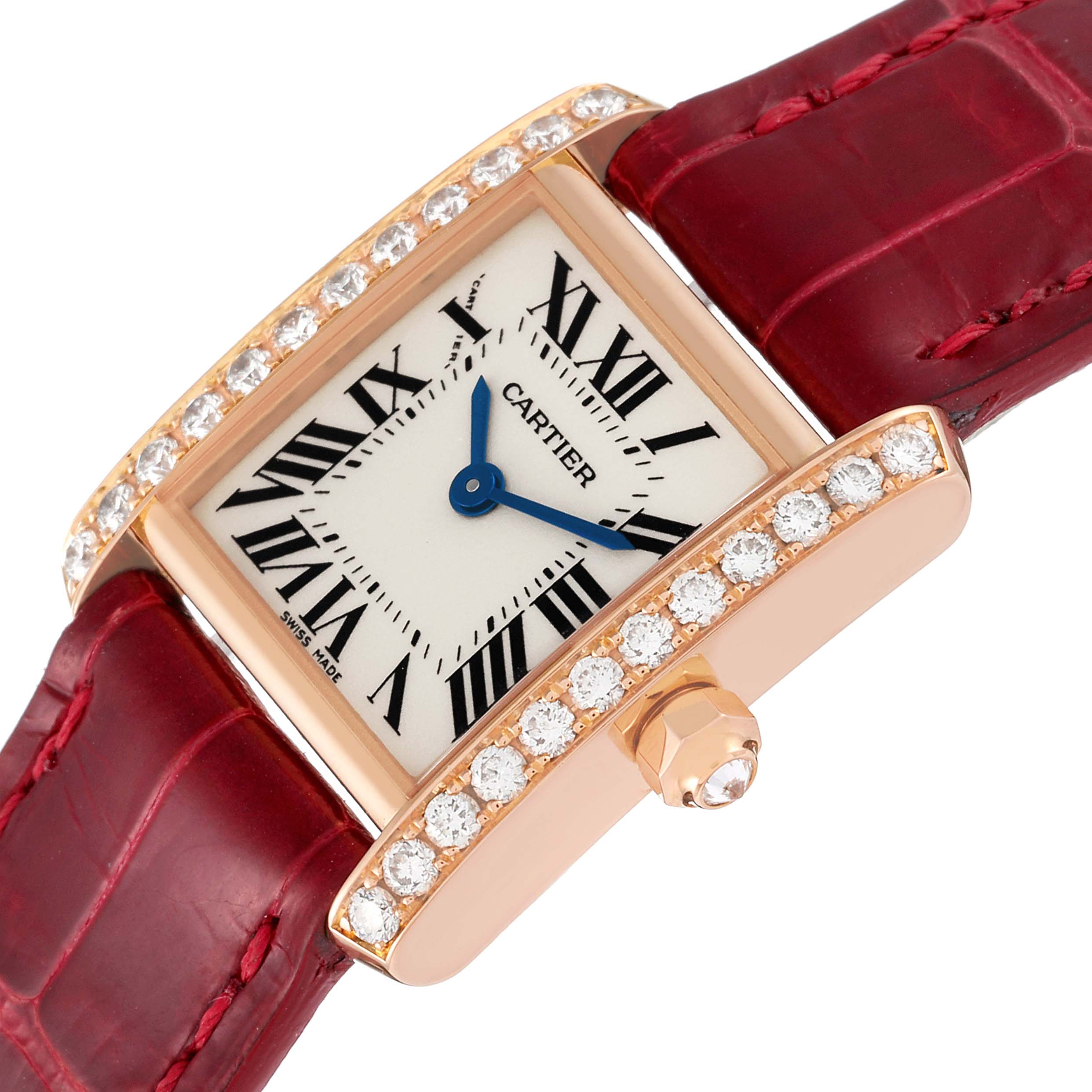The image shows a close-up of a Cartier Tank Francaise WE104531 Women's Rose Gold Silver Dial WE104531 Women's Rose Gold Silver Dial watch, highlighting its diamond-set bezel and red leather strap.