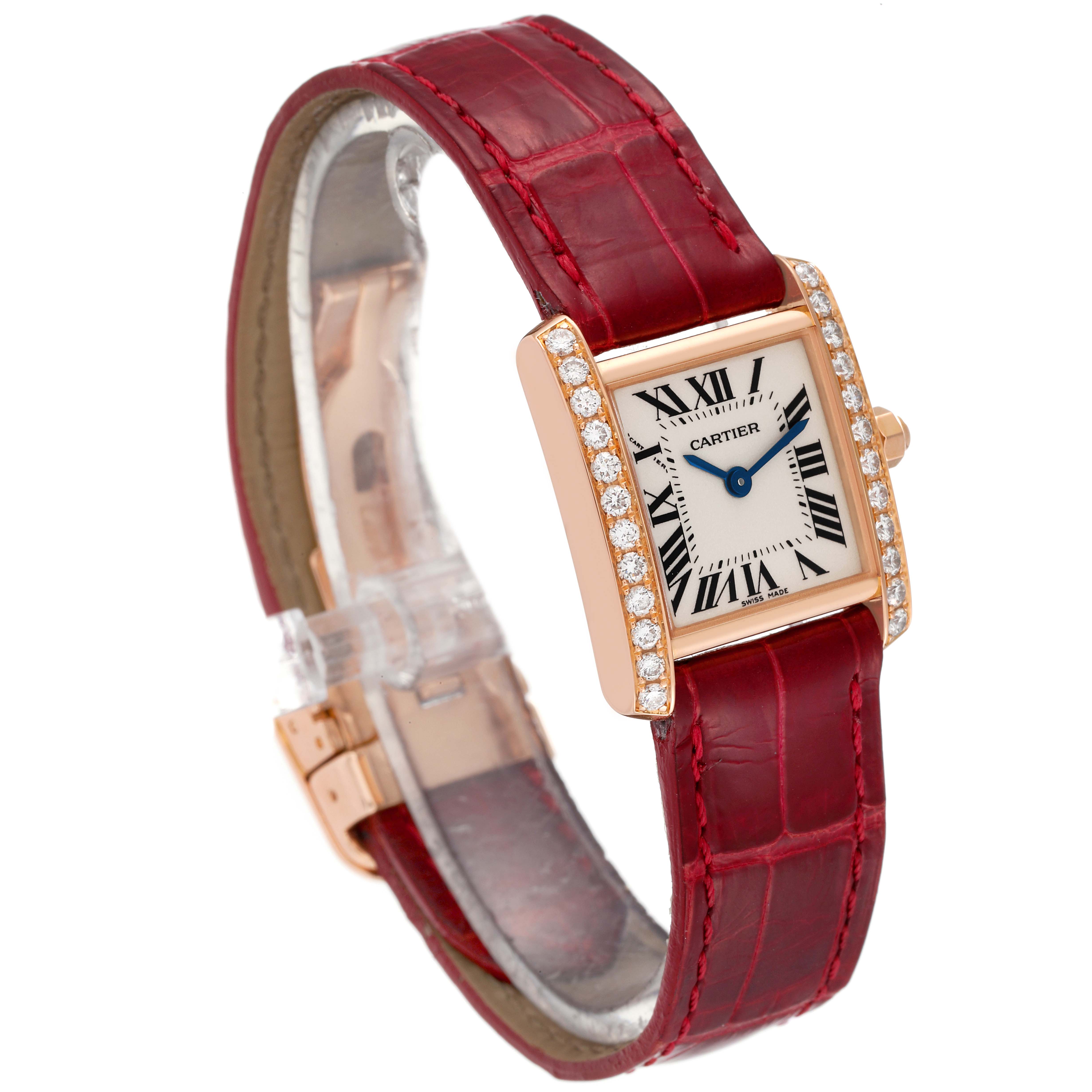 The Cartier Tank Francaise WE104531 Women's Rose Gold Silver Dial WE104531 Women's Rose Gold Silver Dial watch is shown at an angle highlighting its face, bezel with diamonds, and red leather strap.