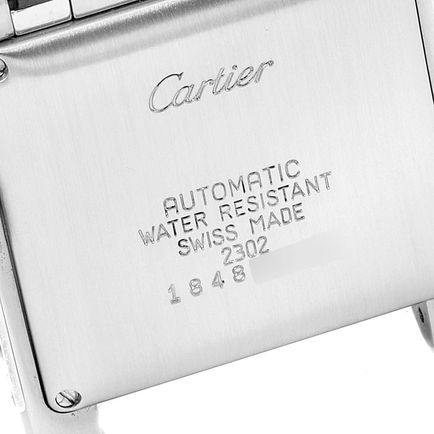 The image shows the back case of a Cartier Tank Francaise W51005Q4 Men's Steel and Gold (two tone) Silver Dial W51005Q4 Men's Steel and Gold (two tone) Silver Dial watch, displaying the branding and specifications.