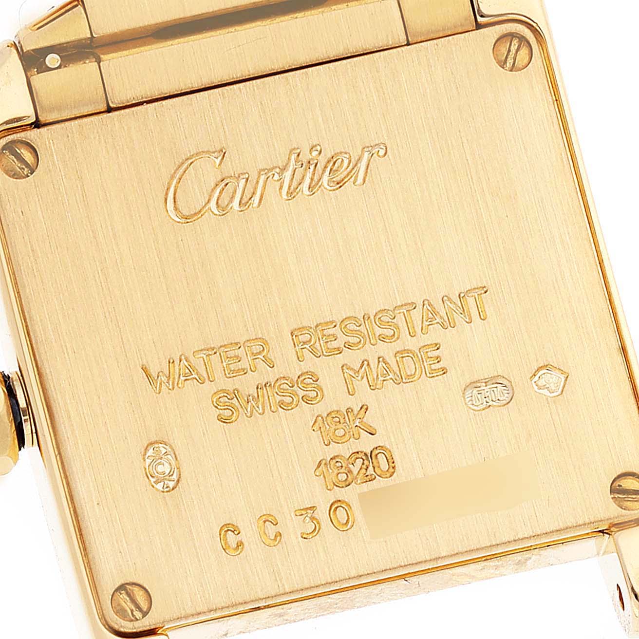 The image shows the back case of a Cartier Tank Francaise W50002N2 Women's Yellow Gold Silver Dial W50002N2 Women's Yellow Gold Silver Dial watch.