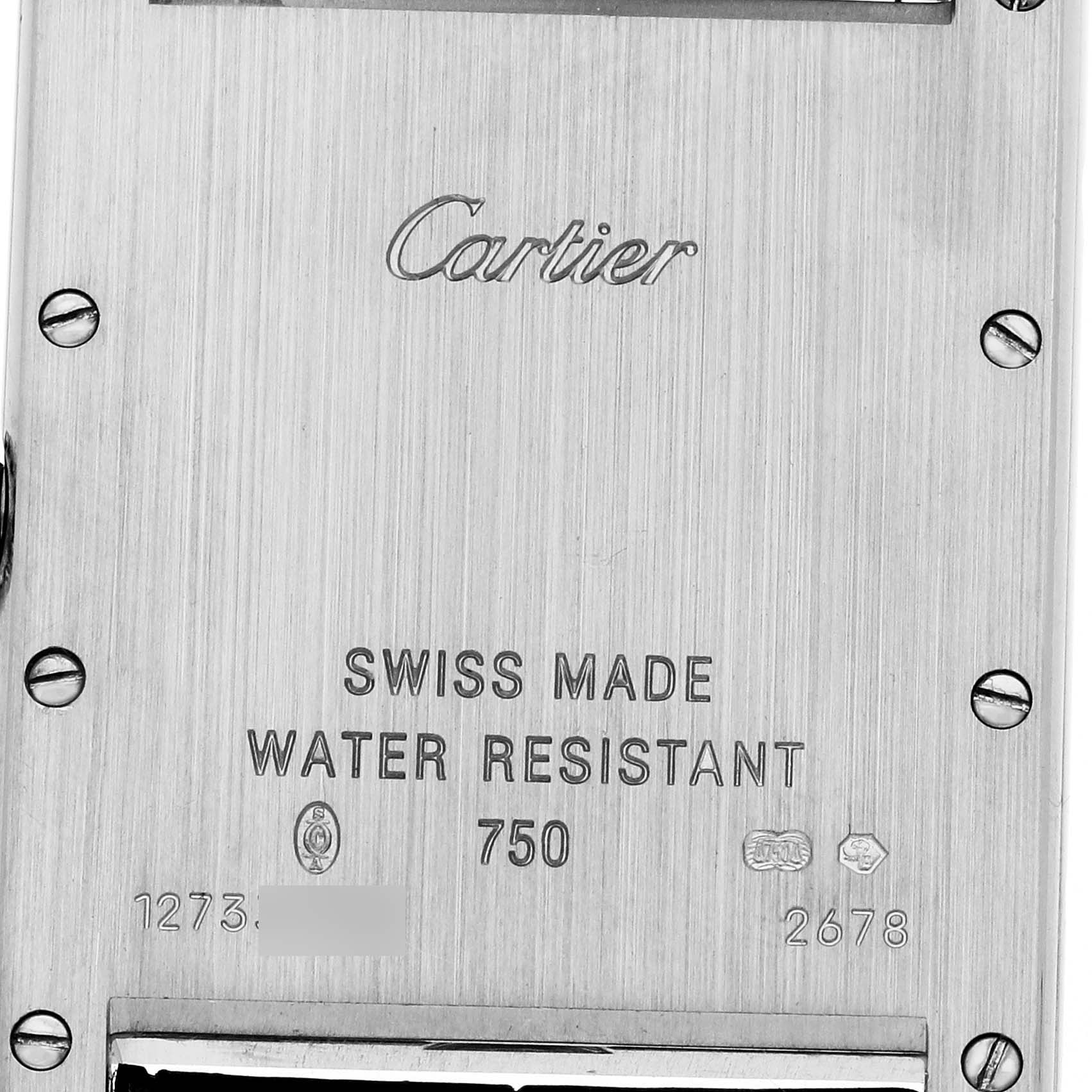 The image shows the back case of a Cartier Tank Louis W1540956 Men's White Gold Silver Dial watch, featuring engraved brand details and specifications.