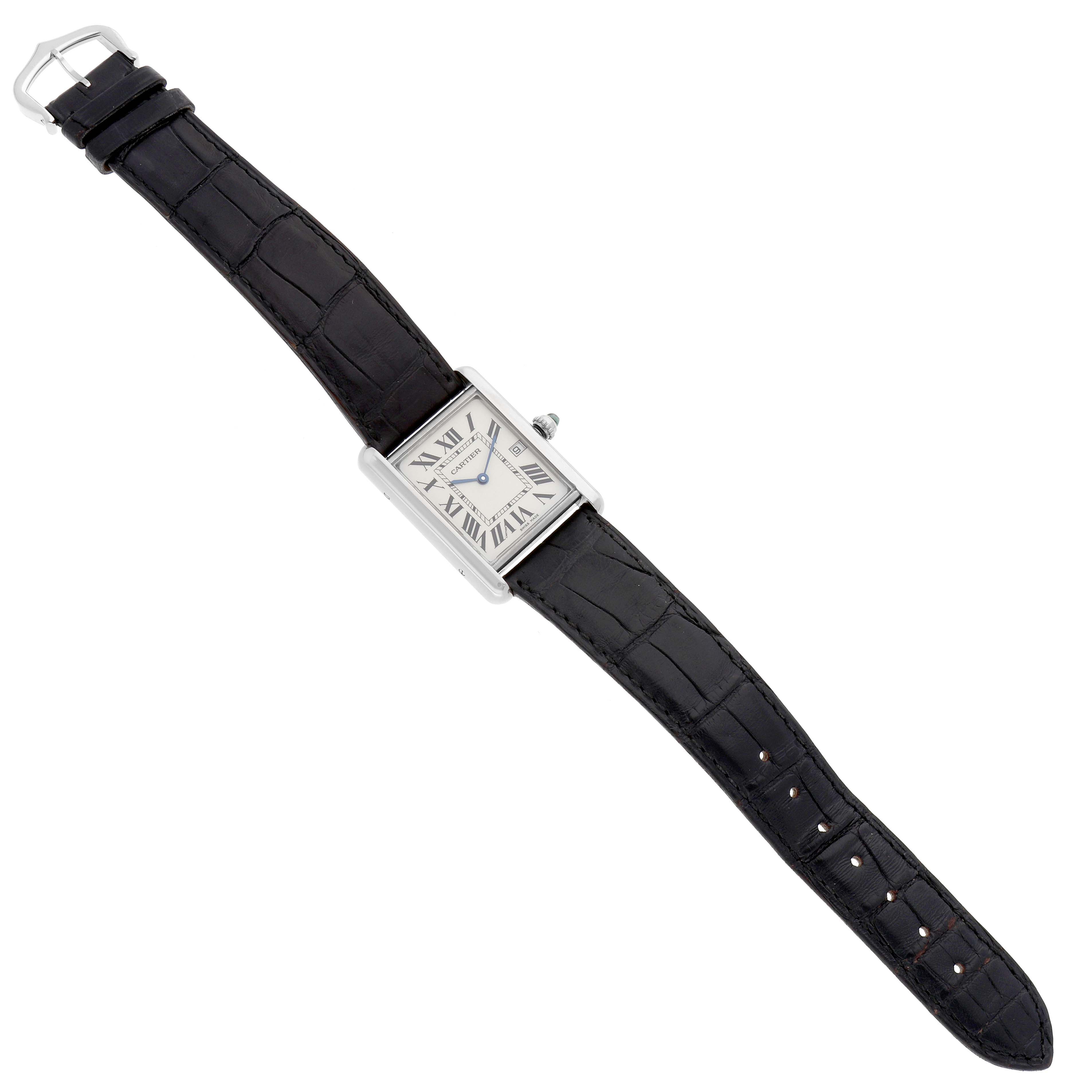 The Cartier Tank Louis W1540956 Men's White Gold Silver Dial watch is shown from a top-down angle, displaying its rectangular face and black leather strap.