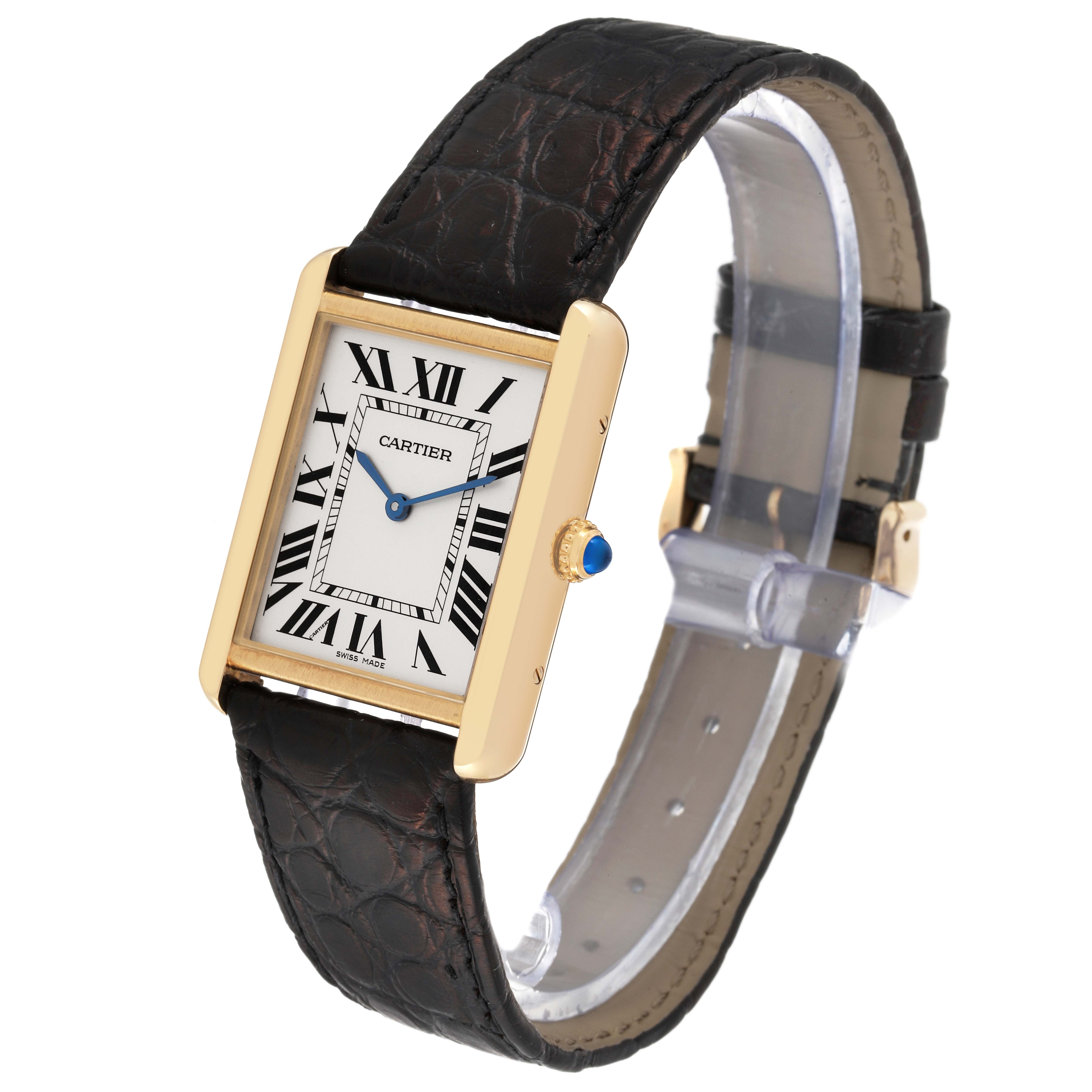 The image shows a side-angle view of the Cartier Tank Solo W5200004 Men
s Steel and Gold (two tone) Silver Dial W5200004 Men
s Steel and Gold (two tone) Silver Dial watch, highlighting its rectangular face, leather strap, and crown.