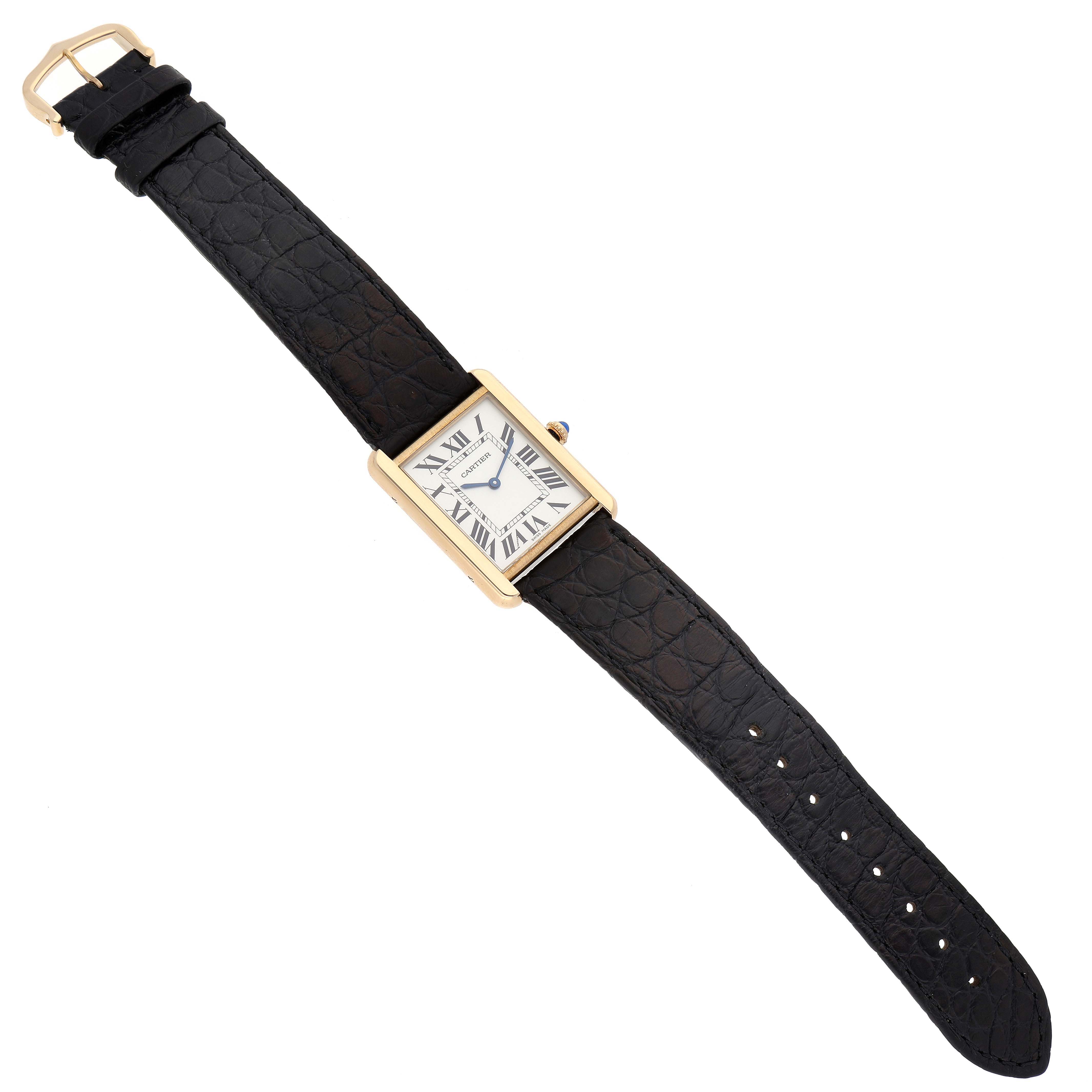 The image shows a Cartier Tank Solo W5200004 Men
s Steel and Gold (two tone) Silver Dial W5200004 Men
s Steel and Gold (two tone) Silver Dial watch with a rectangular gold case and a black leather strap, photographed from a top-down angle.