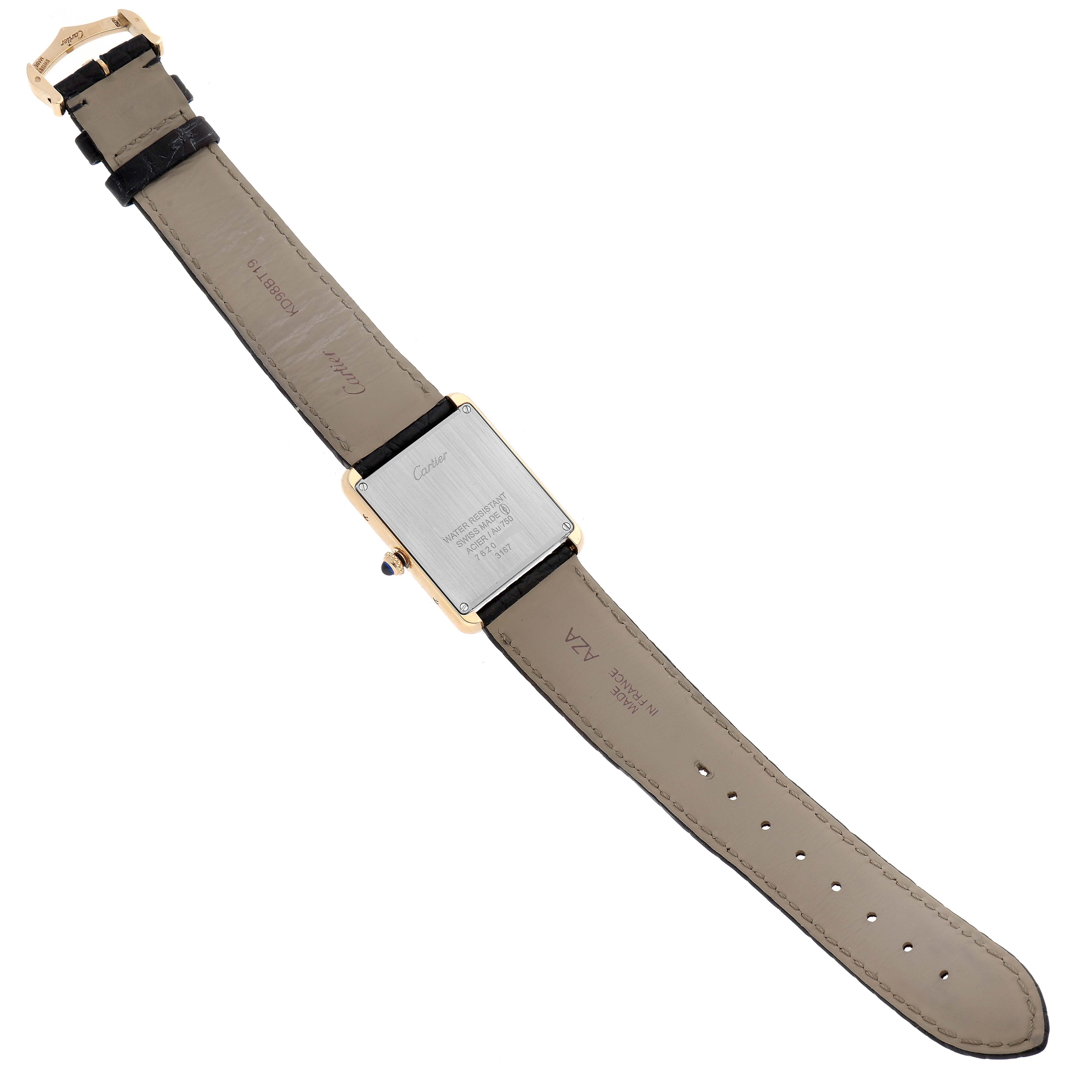 The image shows the back of a Cartier Tank Solo W5200004 Men
s Steel and Gold (two tone) Silver Dial W5200004 Men
s Steel and Gold (two tone) Silver Dial watch, including the case back and the full leather strap.