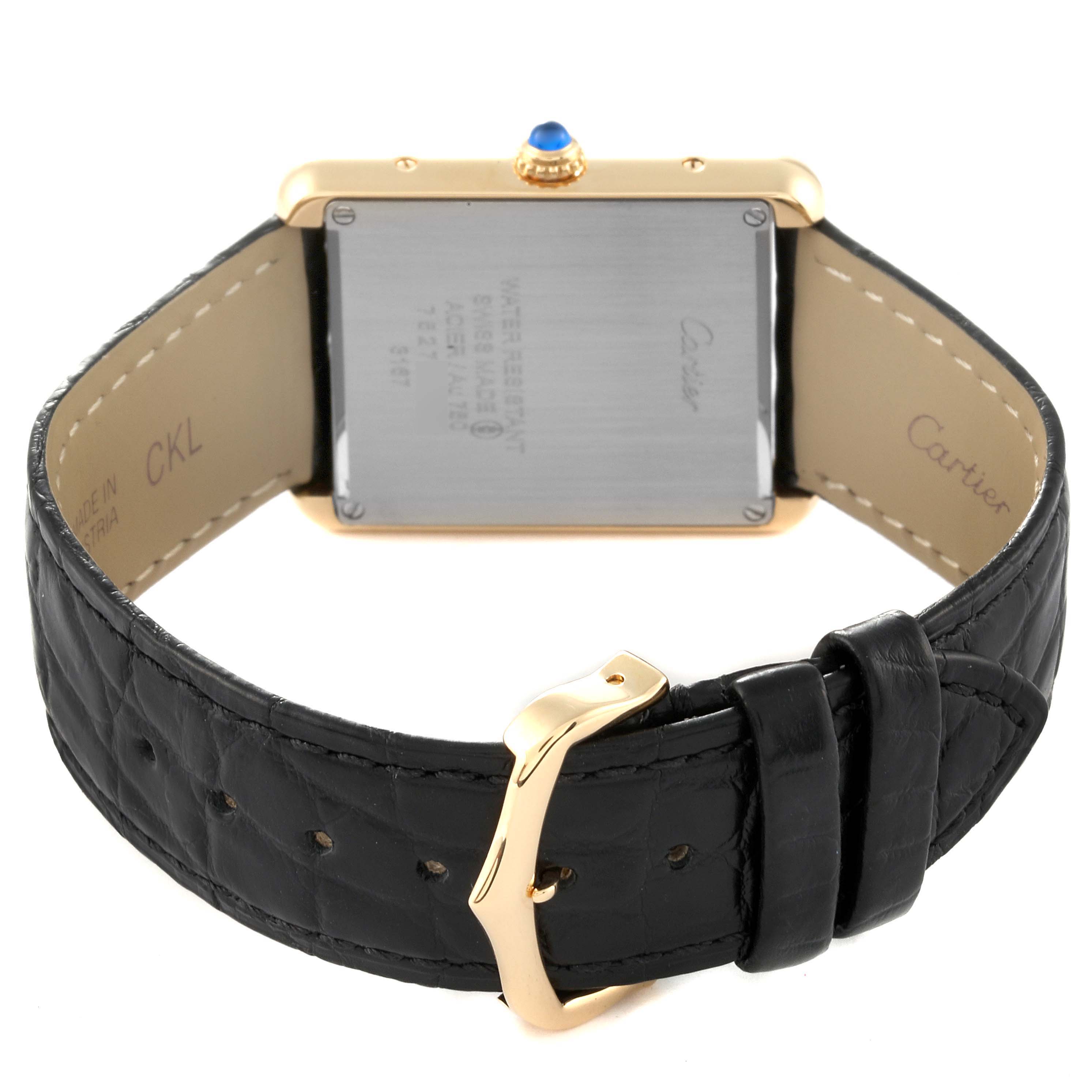 The image shows the back and clasp of the Cartier Tank Solo W5200004 Men
s Yellow Gold Silver Dial W5200004 Men
s Yellow Gold Silver Dial watch.