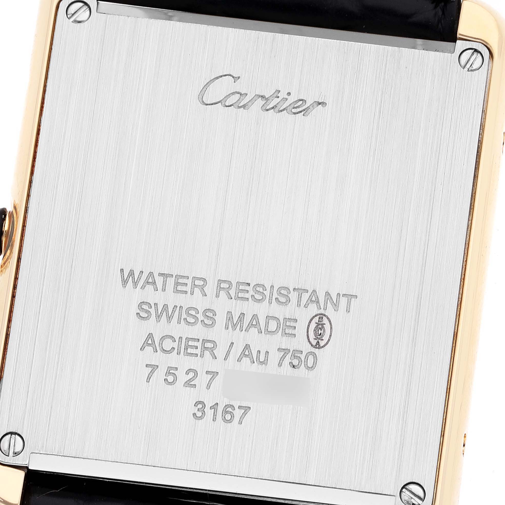 This image shows the back of a Cartier Tank Solo W5200004 Men
s Yellow Gold Silver Dial W5200004 Men
s Yellow Gold Silver Dial watch, highlighting engraved brand details and specifications.