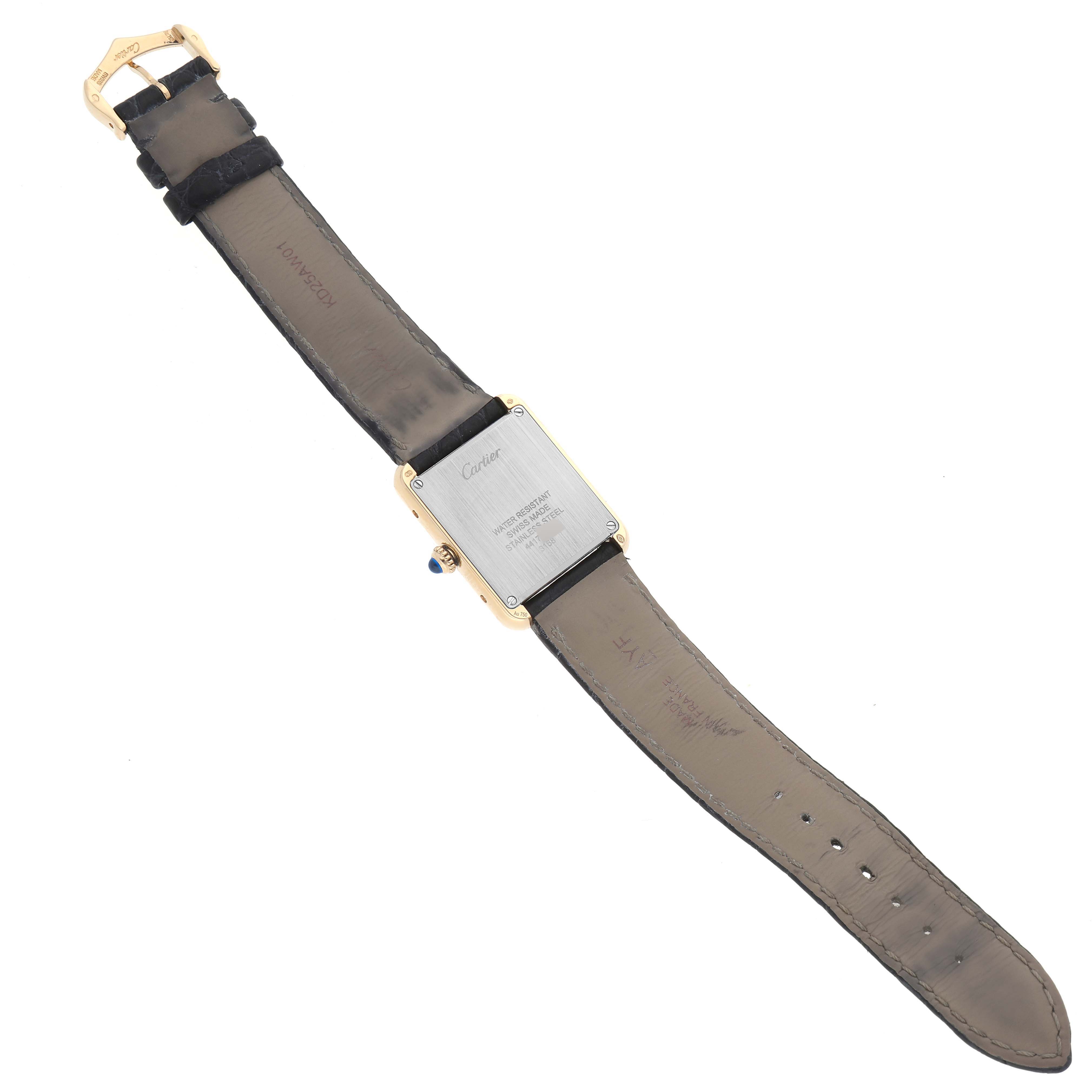 The image shows the back view of a Cartier Tank Solo W5200002 Women
s Steel and Gold (two tone) Silver Dial W5200002 Women
s Steel and Gold (two tone) Silver Dial watch, highlighting the case back, strap, and buckle.