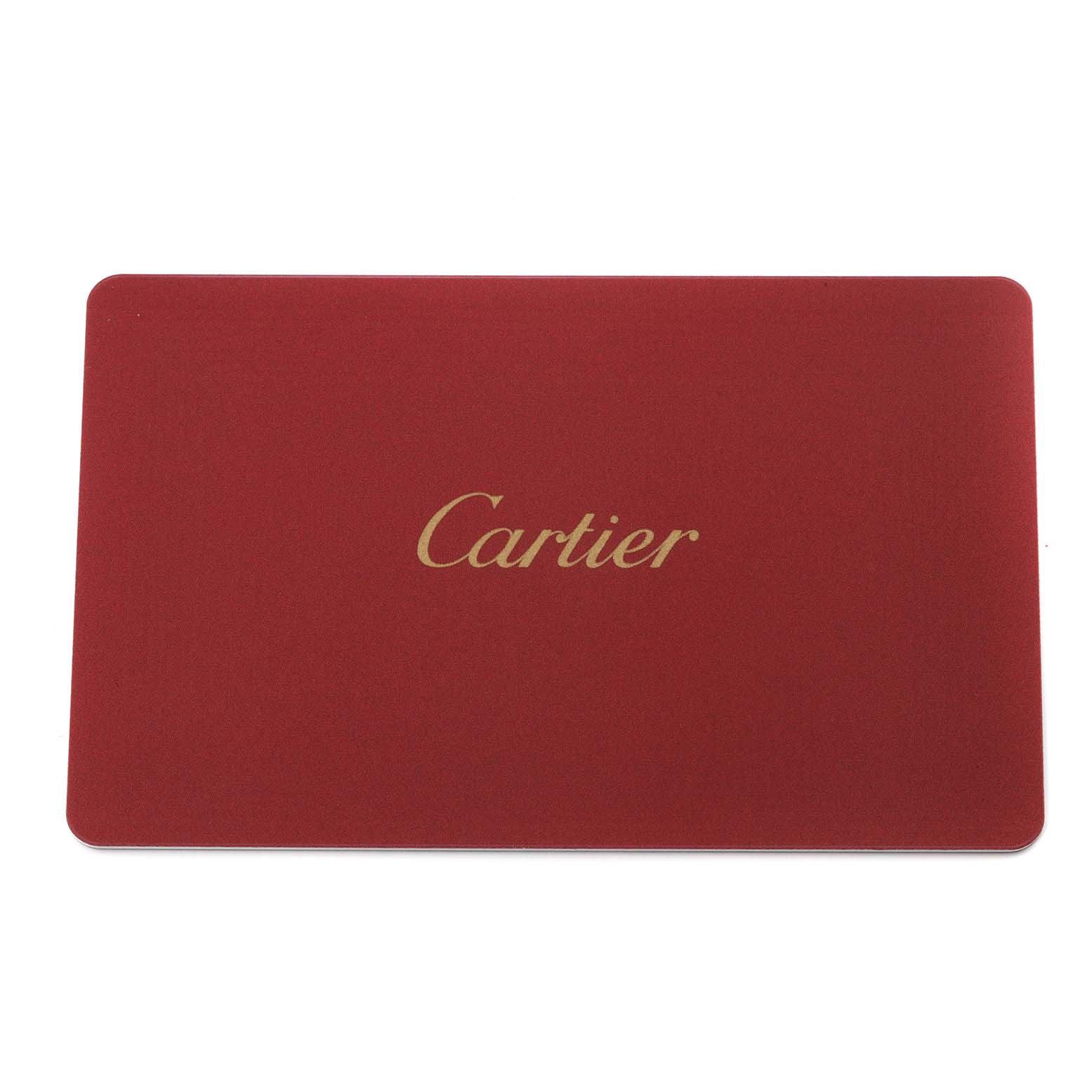 The image shows a red Cartier Best Quality
ation card plate for the Tank Solo model laid flat.