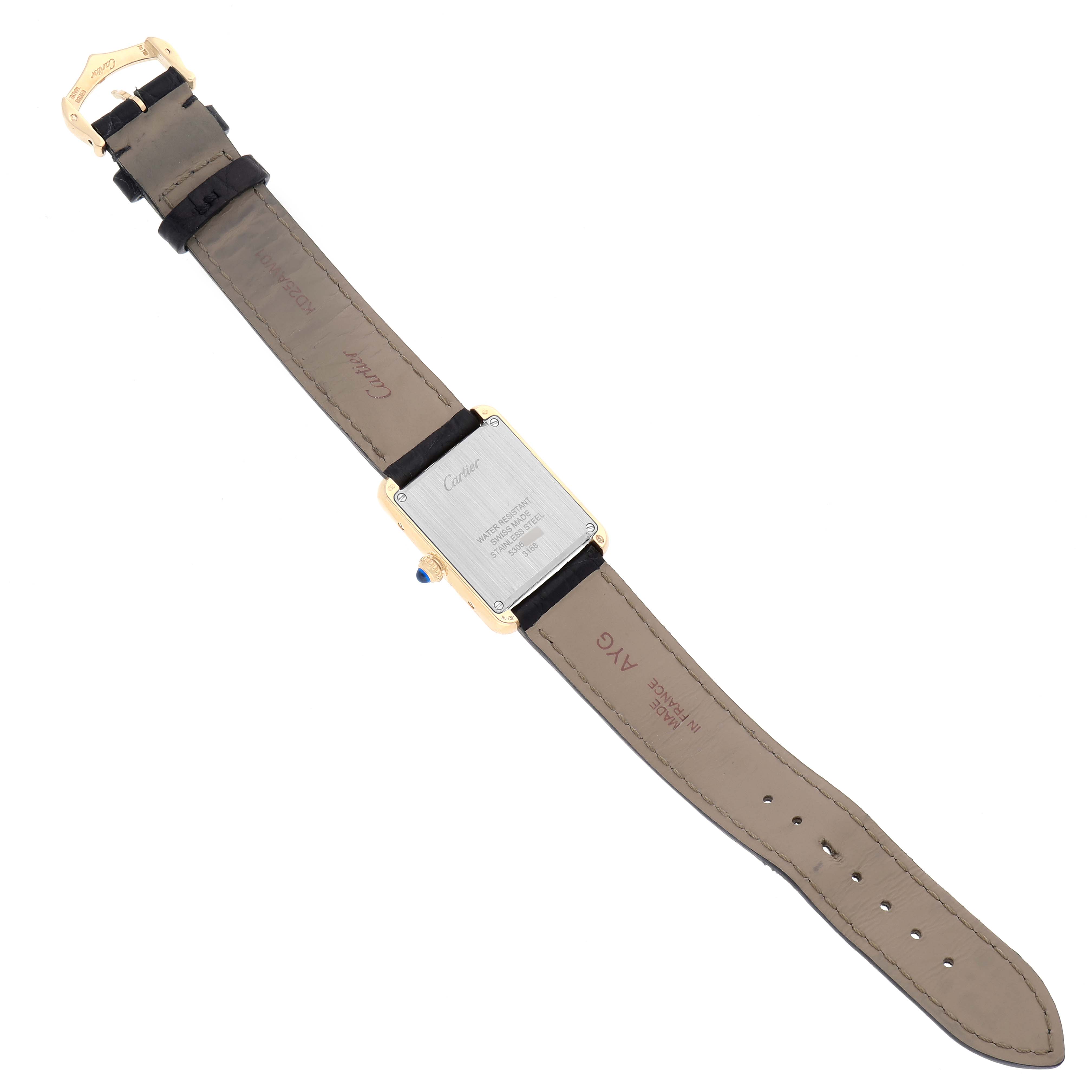 This image shows the back view of a Cartier Tank Solo W5200002 Women
s Steel and Gold (two tone) Silver Dial W5200002 Women
s Steel and Gold (two tone) Silver Dial watch, displaying the case back, strap, and buckle.