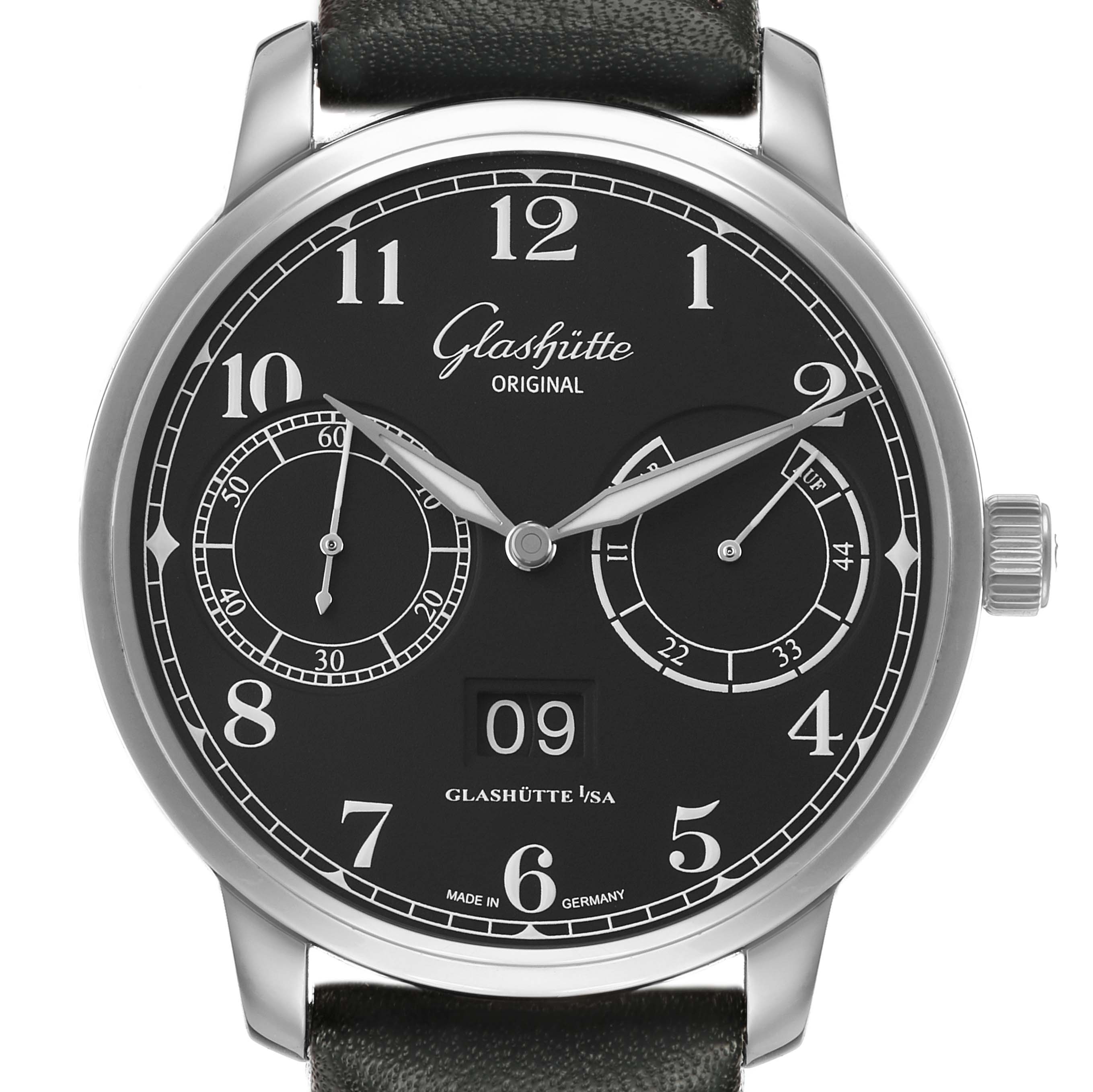 The Glashütte Senator watch is shown from the front, displaying its black dial, Arabic numerals, subdials, and date window.