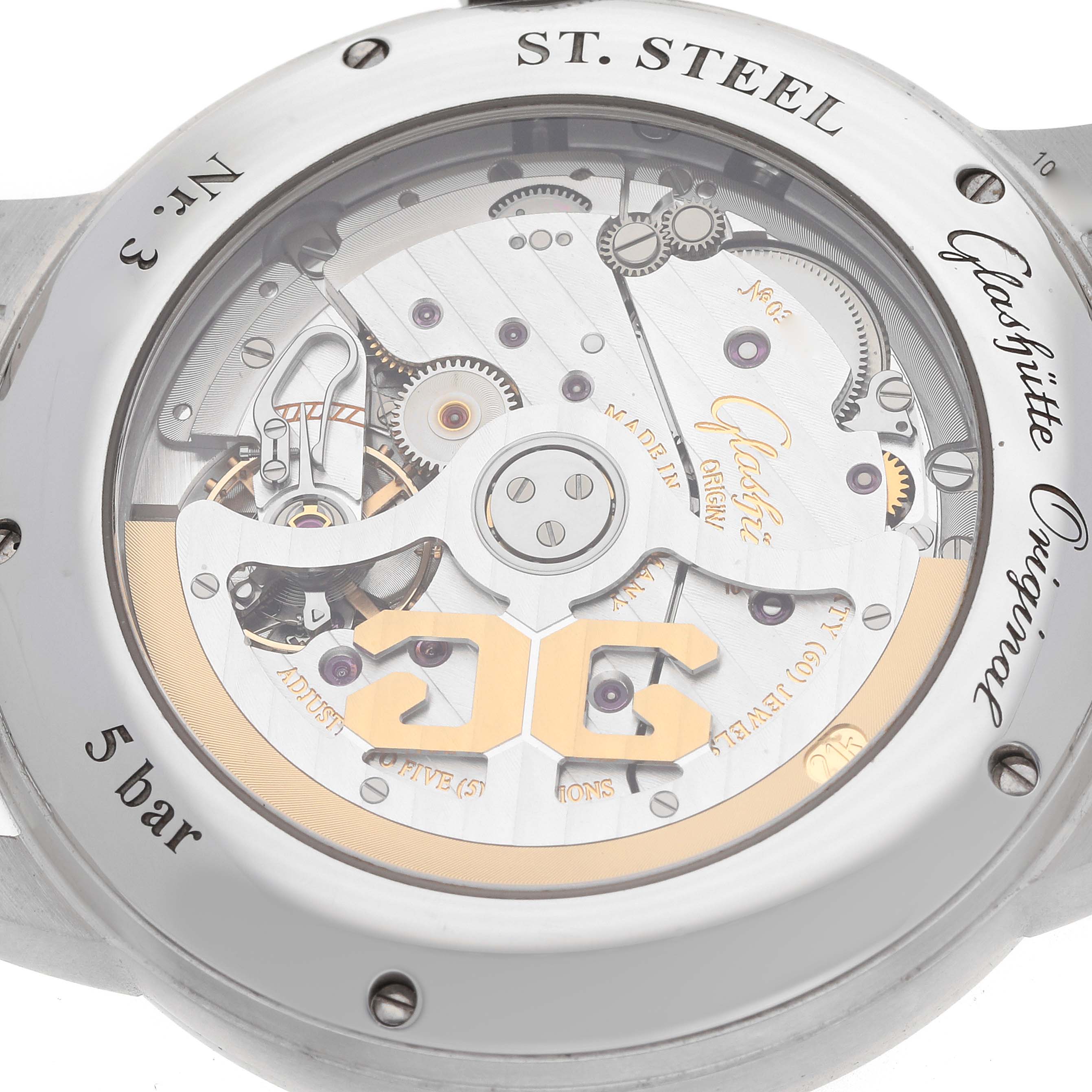 The image shows the back of a Glashütte Senator watch, highlighting the intricate mechanical movement and "ST. STEEL" inscription.