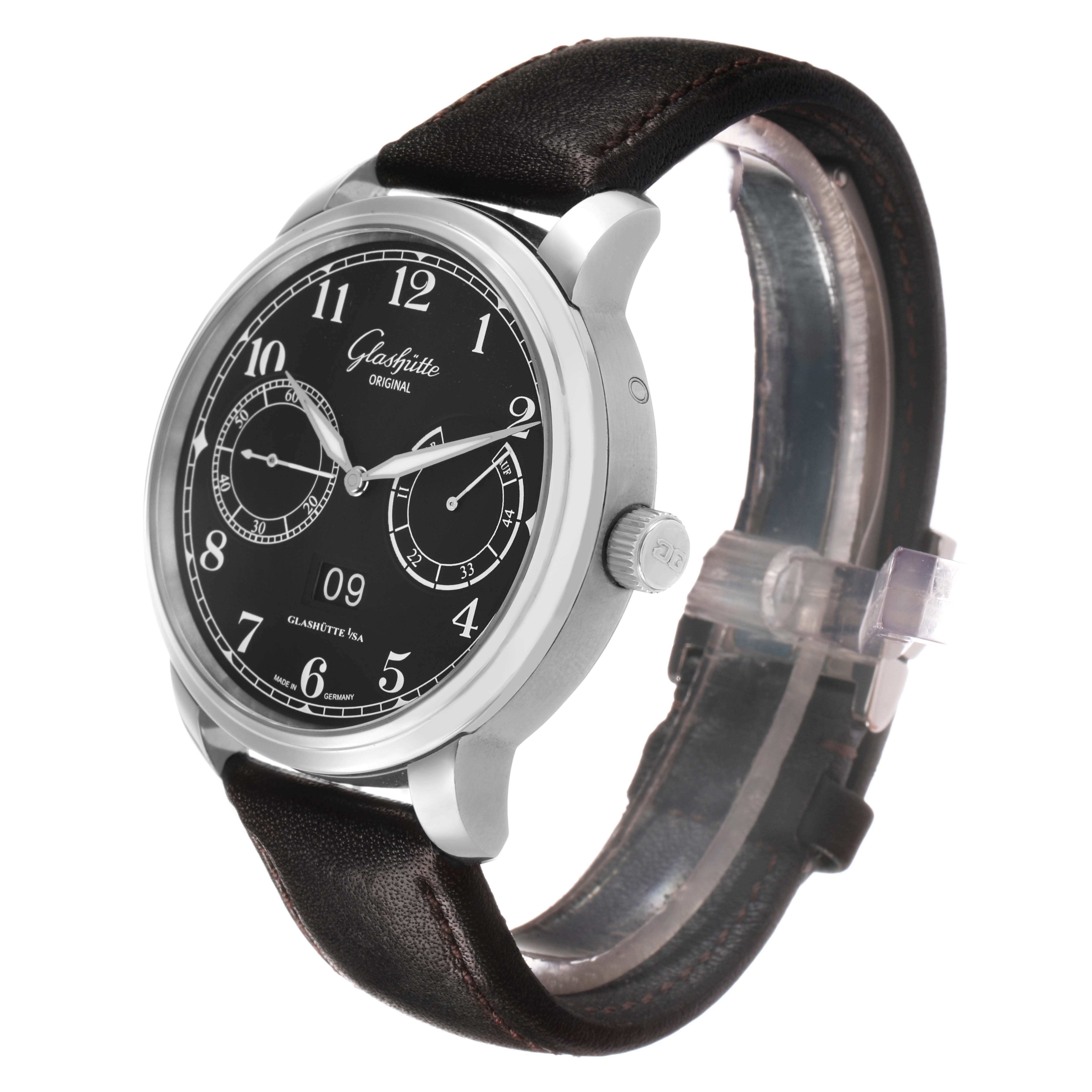 The Glashütte Senator watch is shown at a three-quarter angle, highlighting the face, bezel, crown, and leather strap.