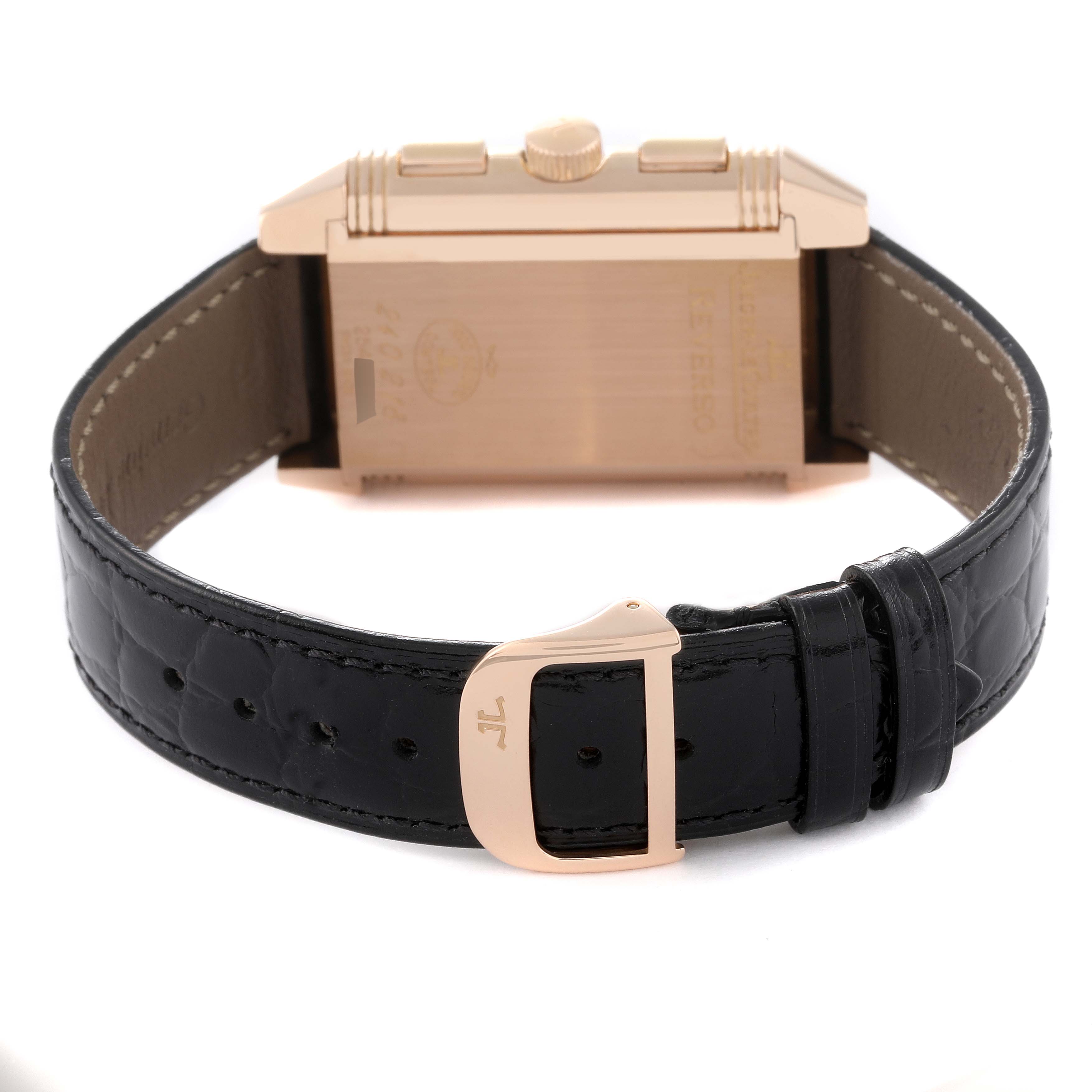 This image shows the back of a Jaeger LeCoultre Reverso Q3022420 Men's Rose Gold Silver Dial Q3022420 Men's Rose Gold Silver Dial watch with its case back, crown, and black leather strap.