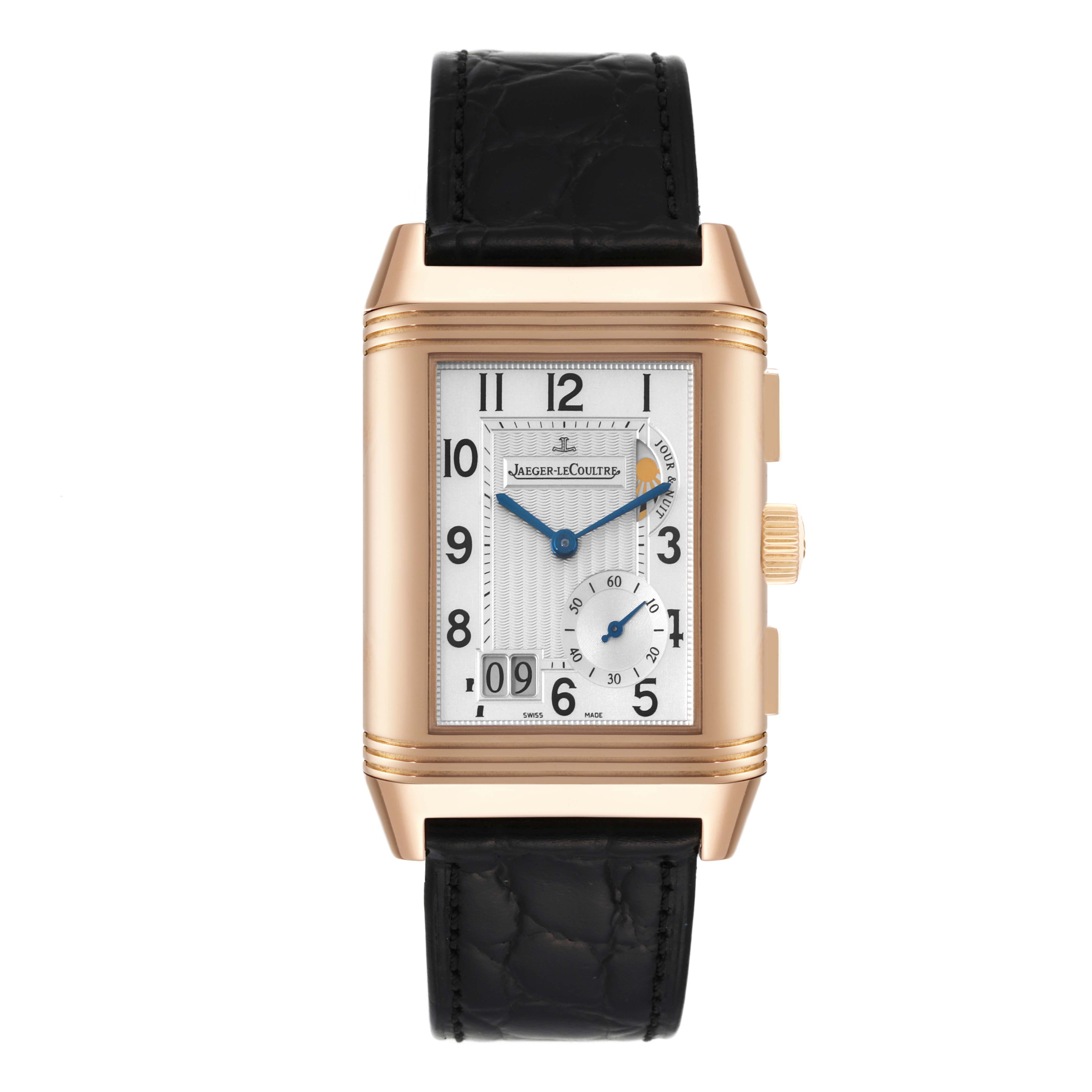 The Jaeger-LeCoultre Reverso watch is shown from the front, displaying its face, dial, and black leather strap.