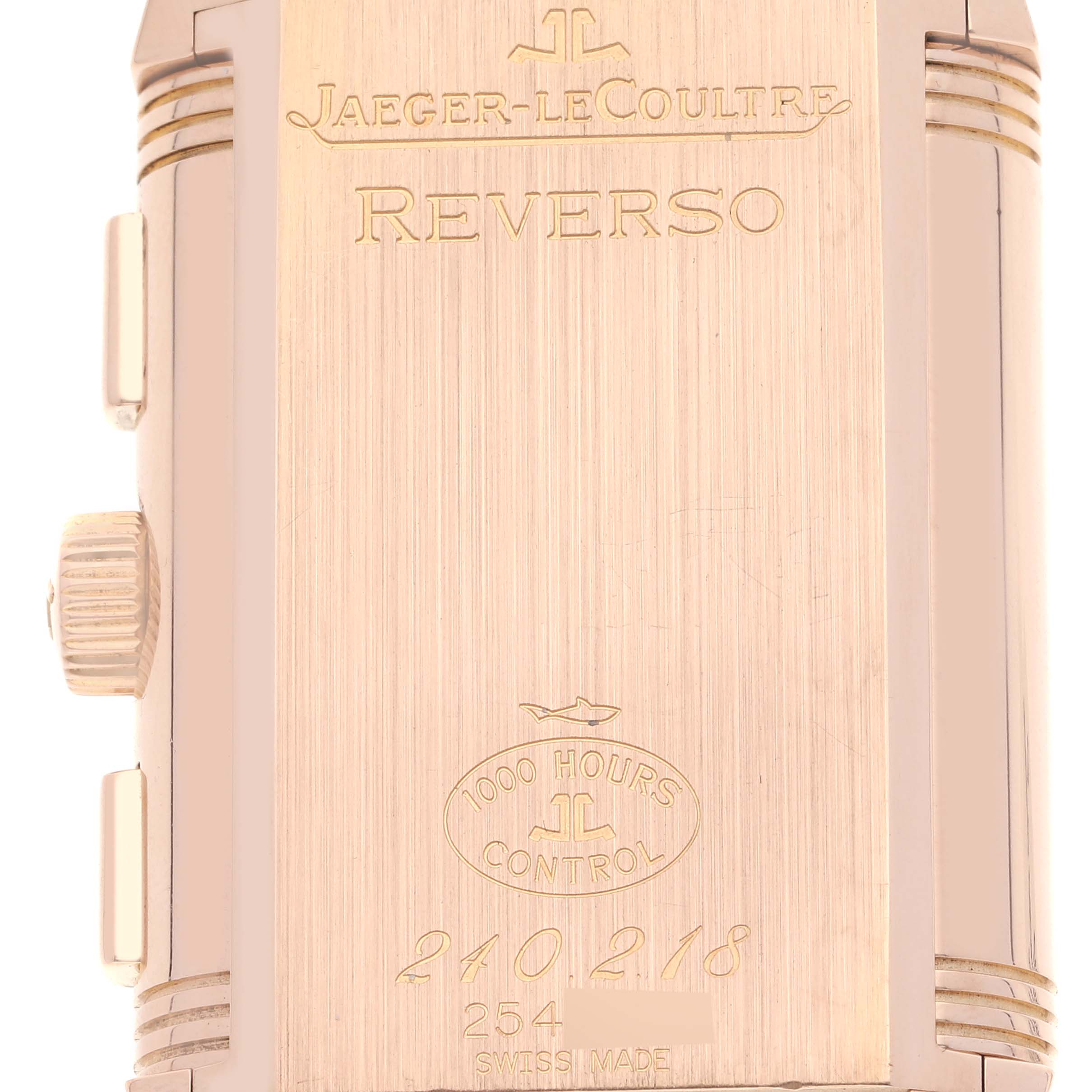This image shows the back case and side view of the Jaeger-LeCoultre Reverso watch, featuring brand engravings.