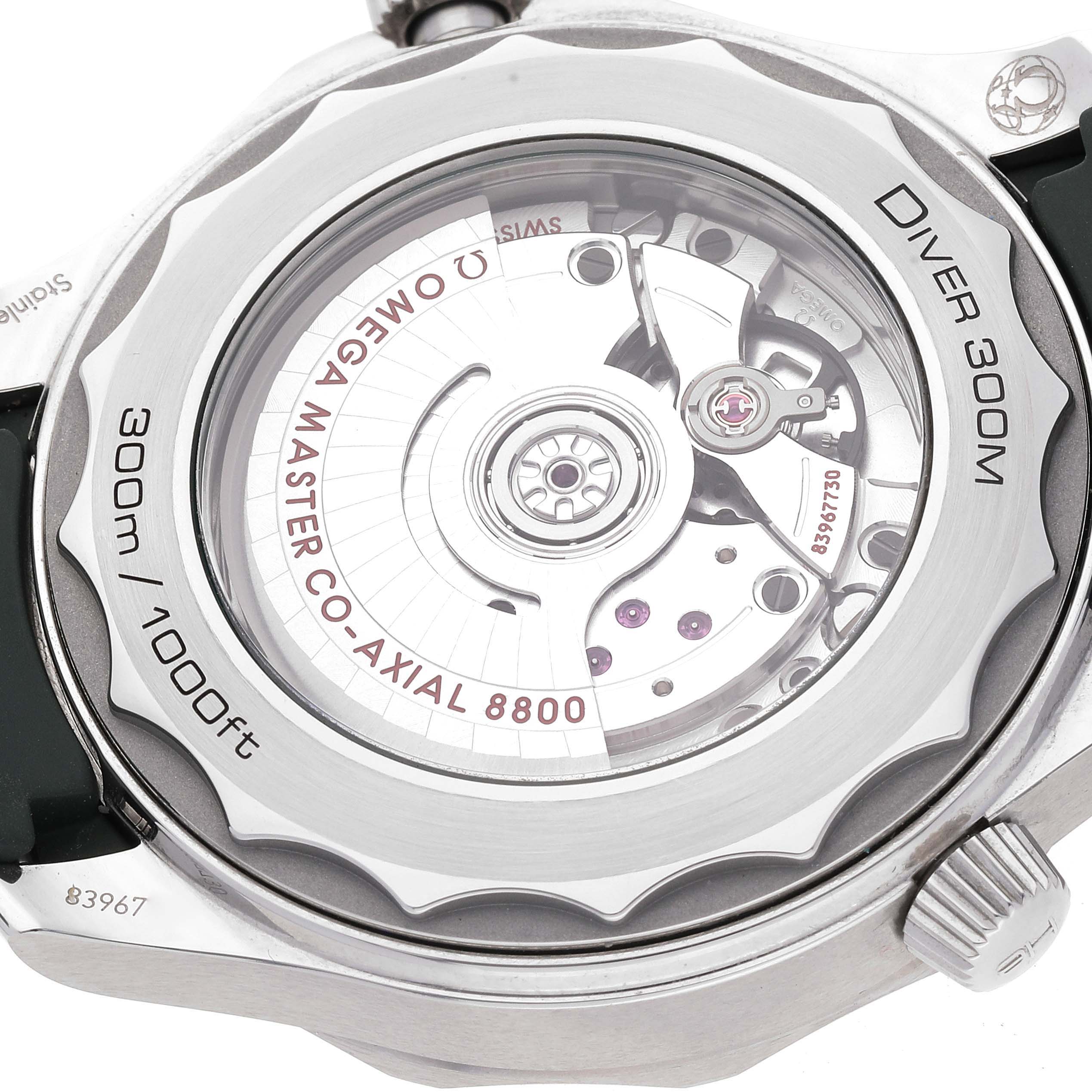 The image shows the backside of the Omega Seamaster 210.32.42.20.10.001 Men's Stainless Steel Green Dial 210.32.42.20.10.001 Men's Stainless Steel Green Dial watch, highlighting its Co-Axial 8800 movement and specifications.