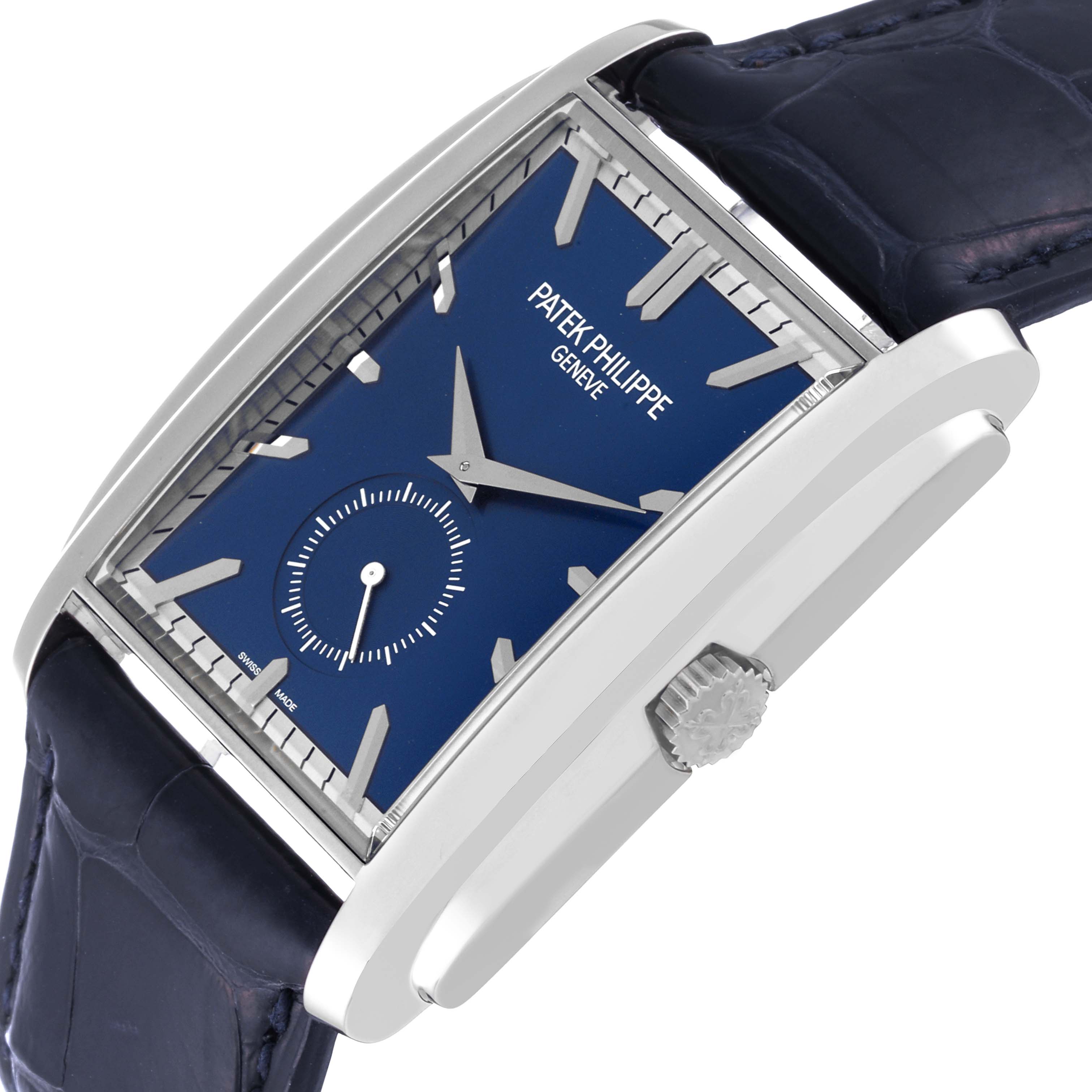 The image shows a side angle of the Patek Philippe Gondolo 5124G Men's White Gold Blue Dial 5124G Men's White Gold Blue Dial watch, highlighting its rectangular face, crown, and strap.