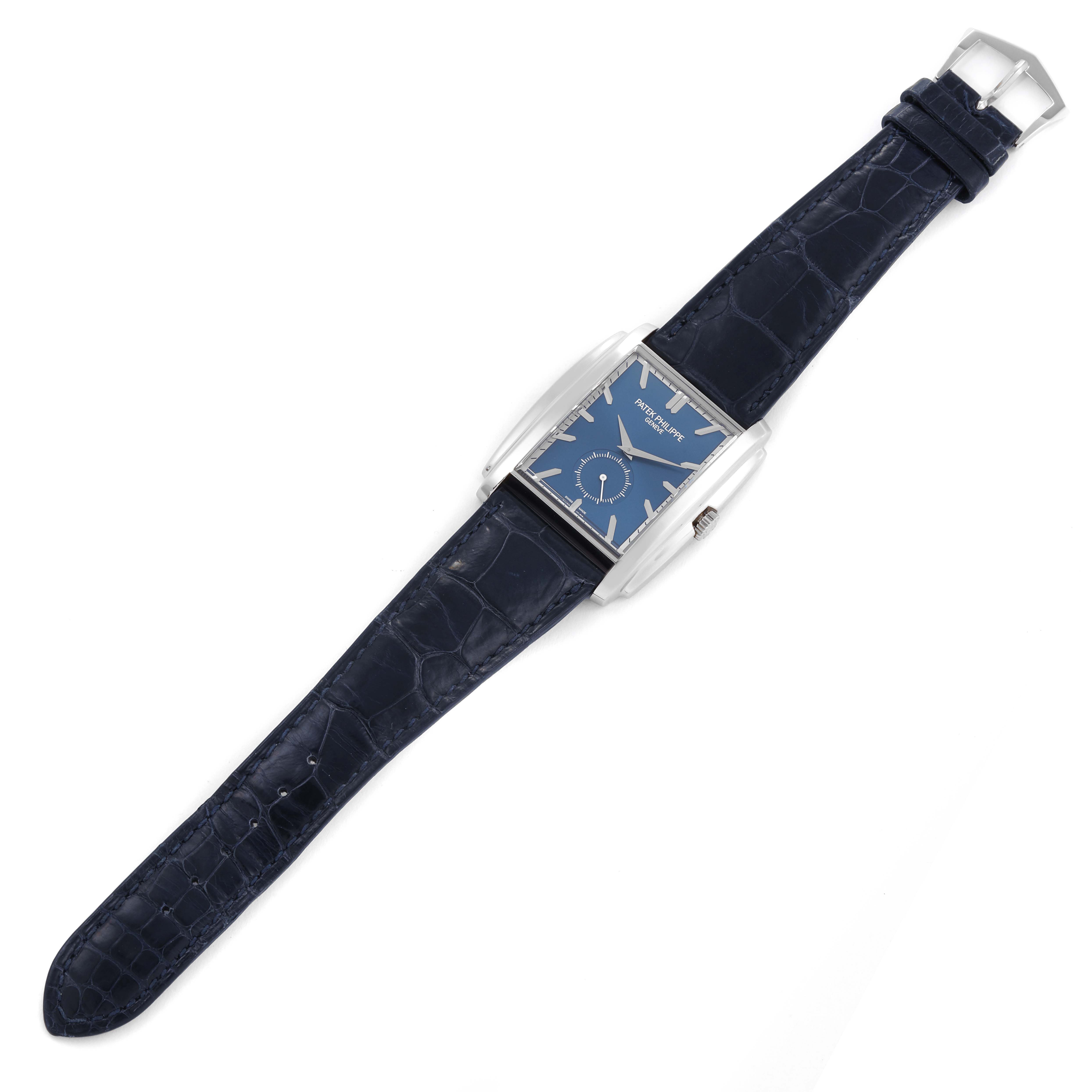 The image shows a top view of a Patek Philippe Gondolo 5124G Men's White Gold Blue Dial 5124G Men's White Gold Blue Dial watch with a blue dial and a dark blue leather strap.