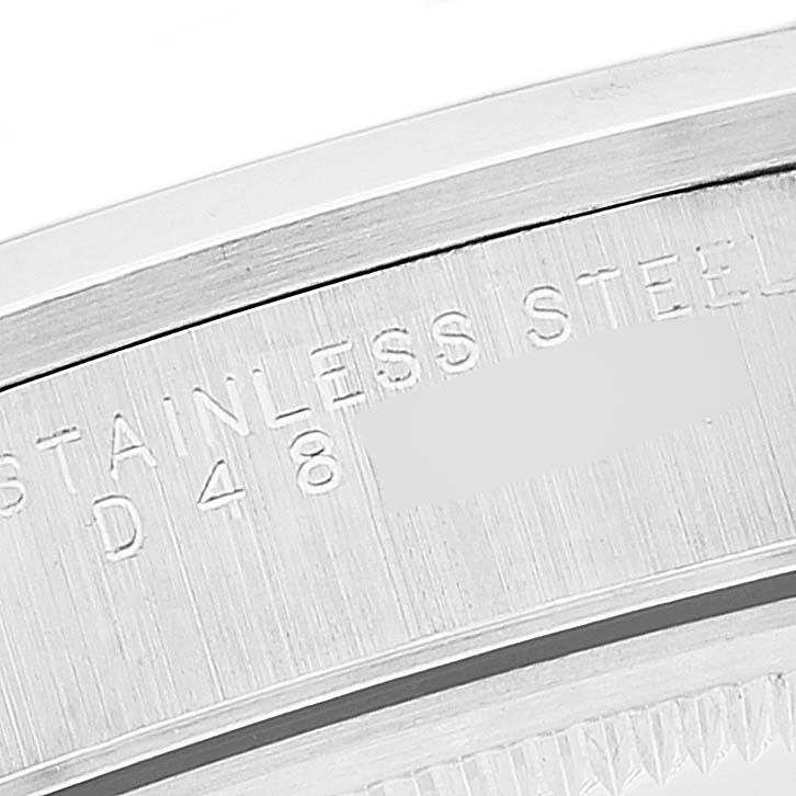 The image shows a close-up view of the engraving on the stainless steel case of a Rolex Air-King 14000 Men's Stainless Steel Silver Dial 14000 Men's Stainless Steel Silver Dial watch.