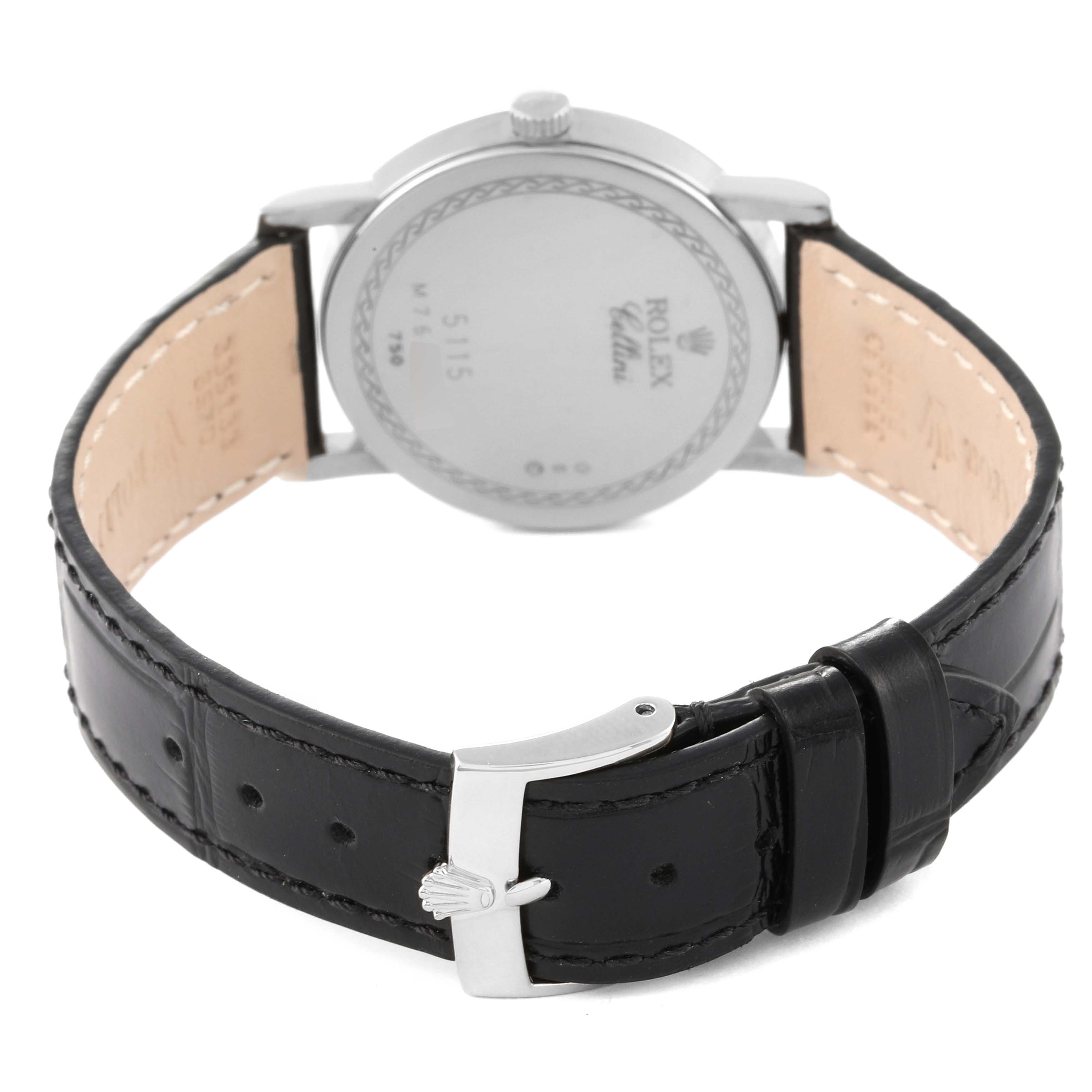 This image shows the back view of a Rolex Cellini 5115/9 Men's White Gold Beige Dial 5115/9 Men's White Gold Beige Dial watch, highlighting its case back, leather strap, and clasp.