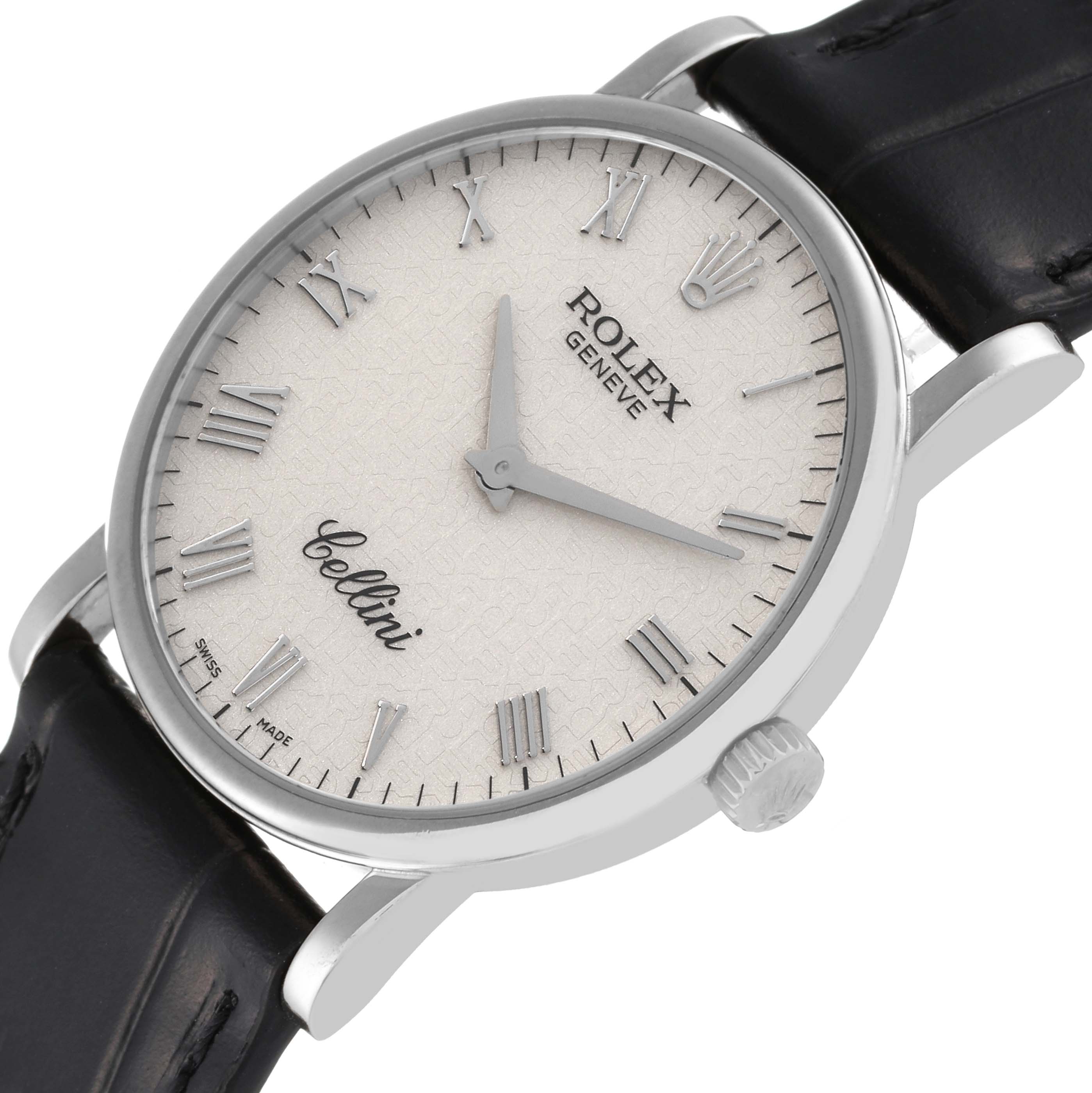 The Rolex Cellini 5115/9 Men's White Gold Beige Dial 5115/9 Men's White Gold Beige Dial watch is shown at an angled close-up view, highlighting its dial, crown, and black leather strap.