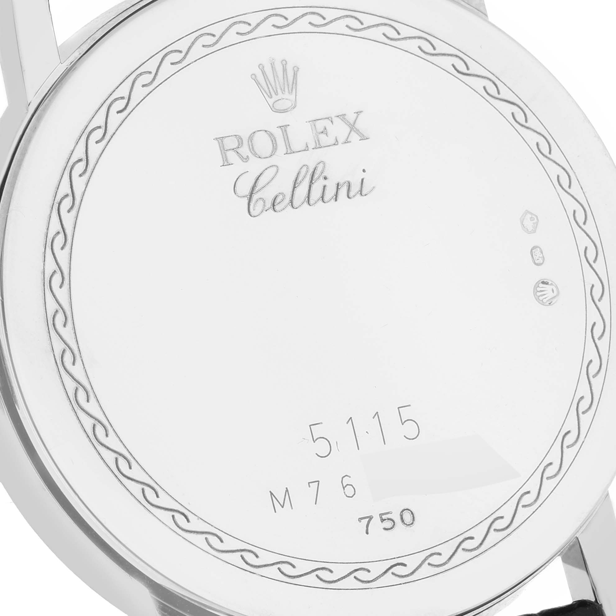 The image shows the back of the Rolex Cellini 5115/9 Men's White Gold Beige Dial 5115/9 Men's White Gold Beige Dial watch, featuring engraved details and markings.