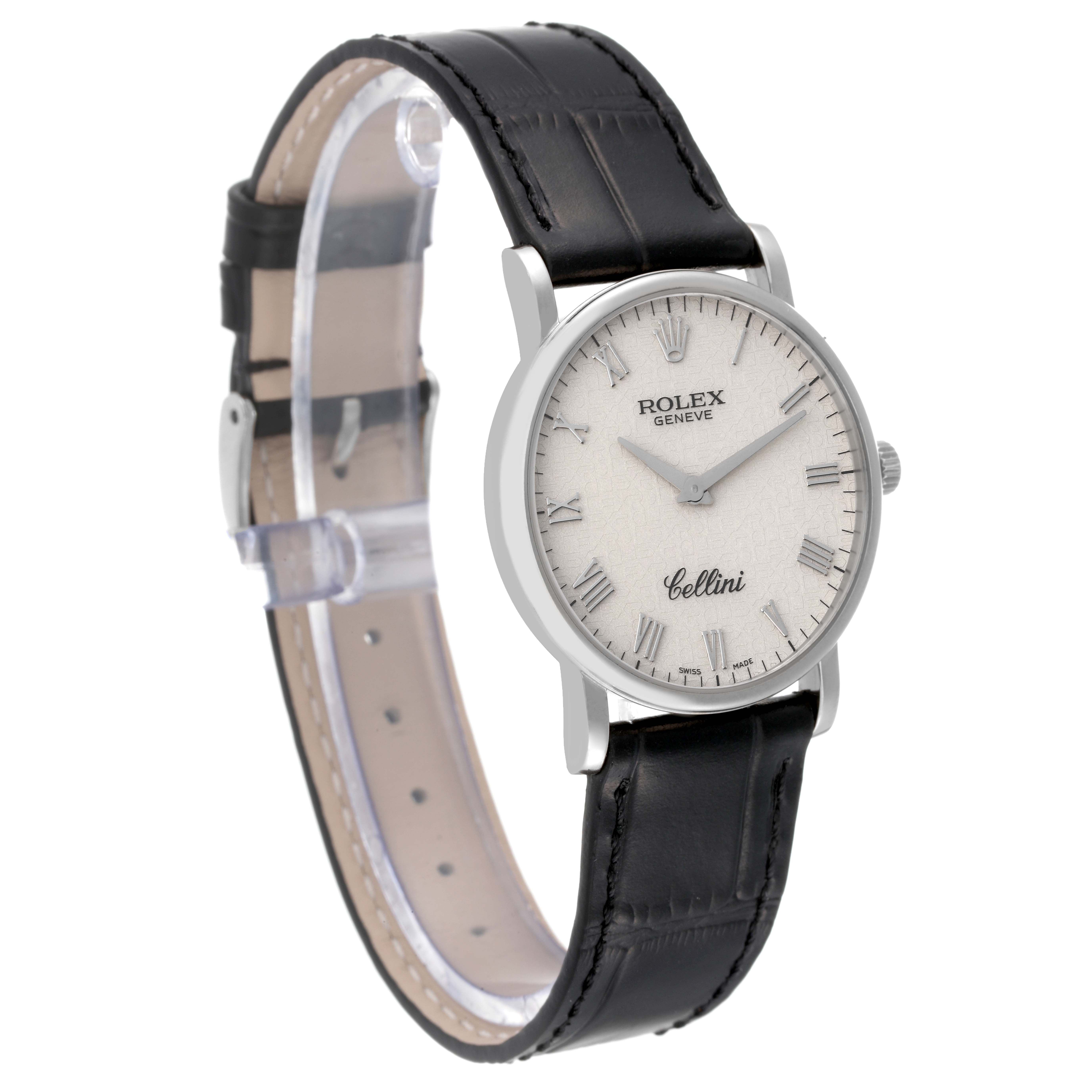 The Rolex Cellini 5115/9 Men's White Gold Beige Dial 5115/9 Men's White Gold Beige Dial watch is shown at a slight angle, highlighting its face, bezel, and black leather strap.