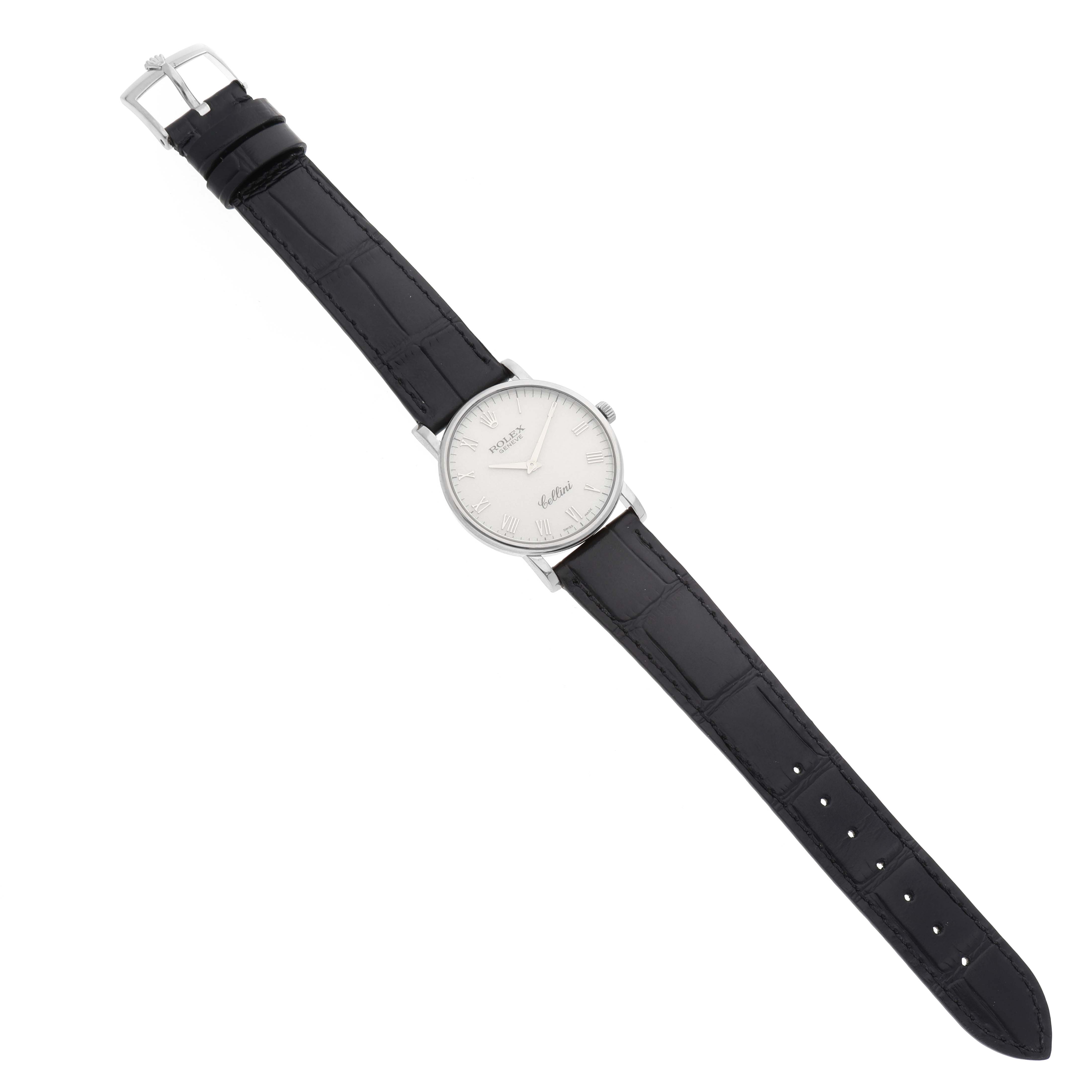 The Rolex Cellini 5115/9 Men's White Gold Beige Dial 5115/9 Men's White Gold Beige Dial watch is shown from a top-down angle, displaying the full leather strap, case, and dial.