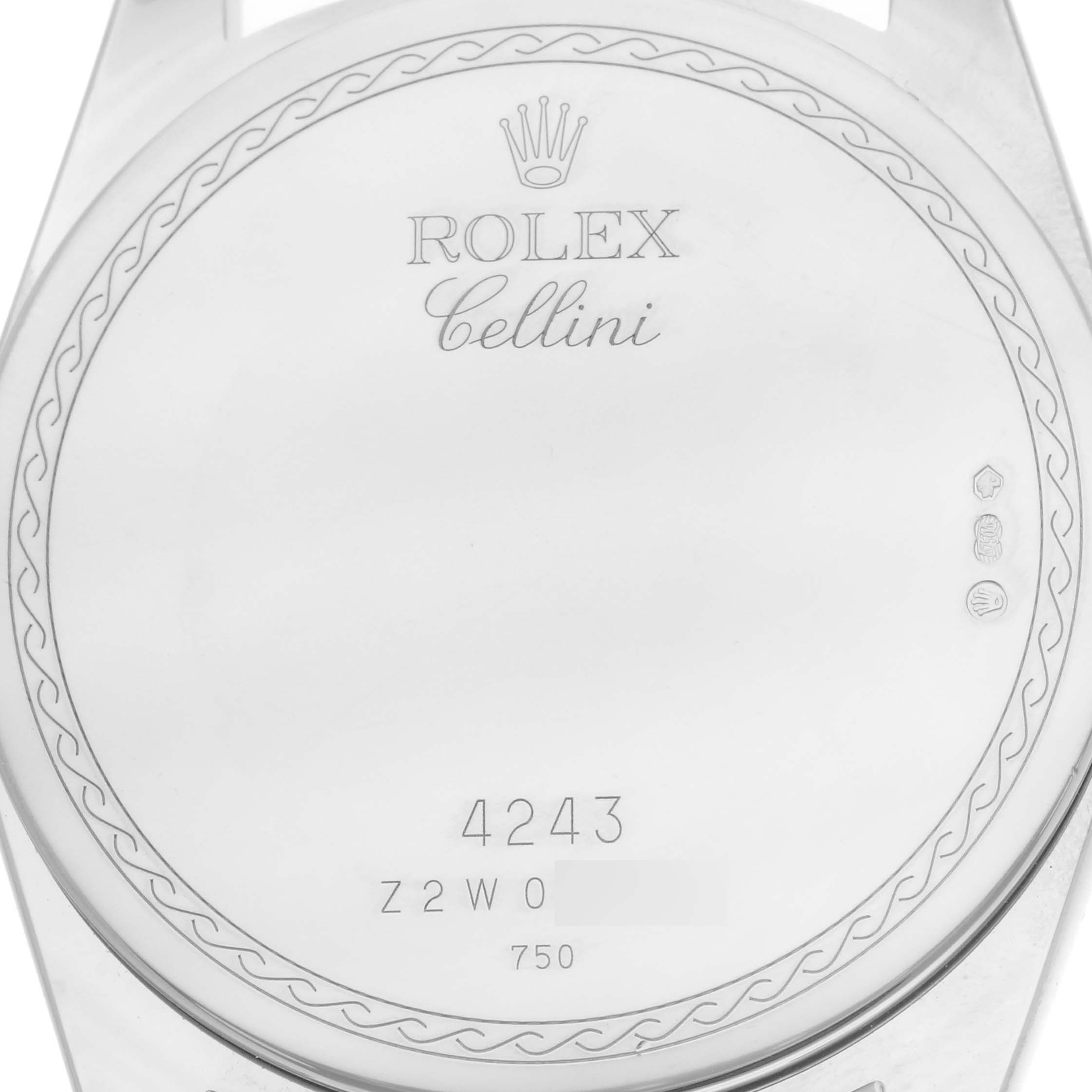 The image shows the back case of a Rolex Cellini 4243/9-BIC Men's White Gold Black Dial watch with engraved details and hallmarks.