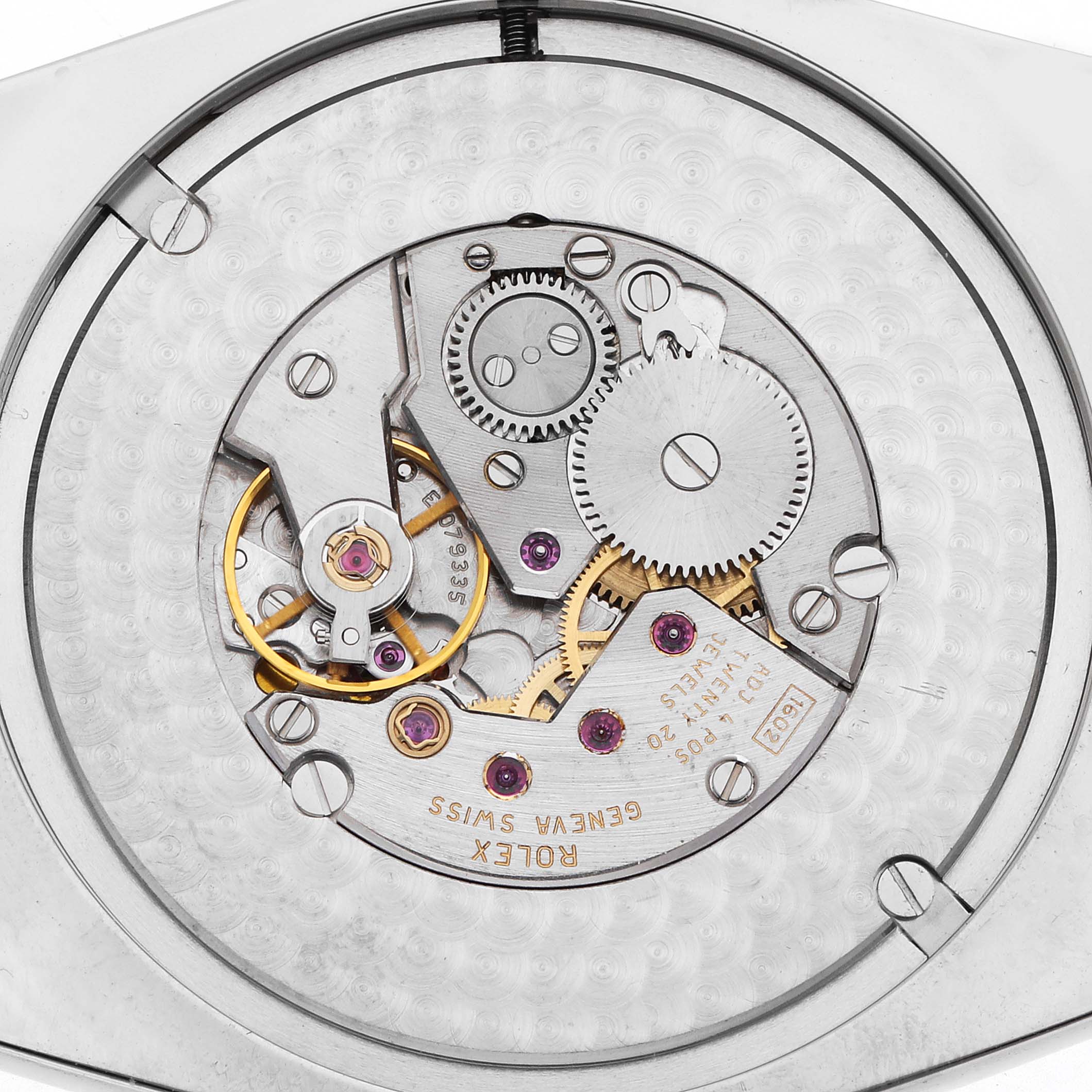 The image shows a close-up view of the movement mechanism of a Rolex Cellini 4243/9-BIC Men's White Gold Black Dial watch, highlighting gears and jewels.